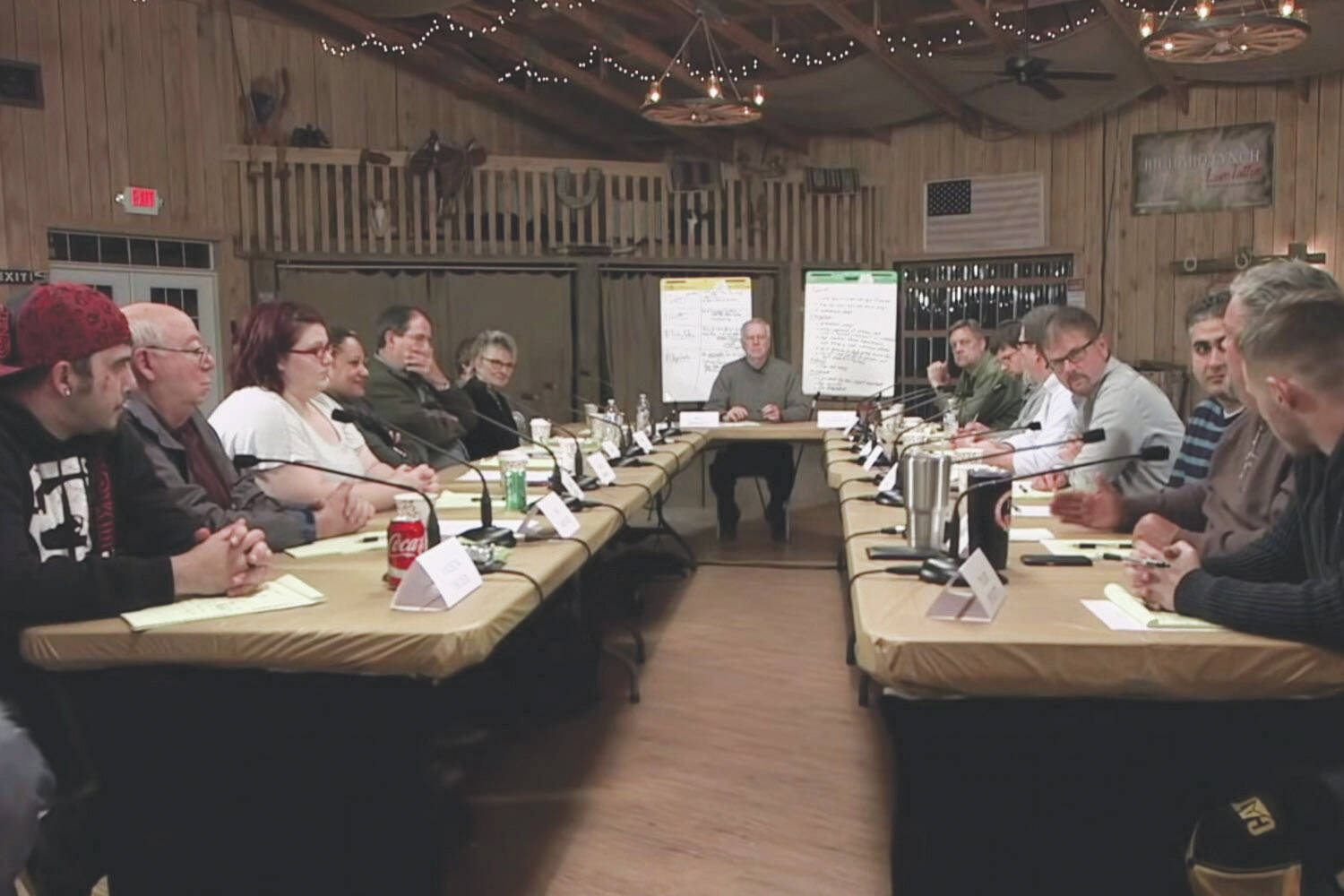 People identifying as Democrats and people identifying as Republicans sit face to face during a workshop put on by Braver Angels in this screenshot from “Braver Angels: Reuniting America.” (Screenshot courtesy Braver Angels)