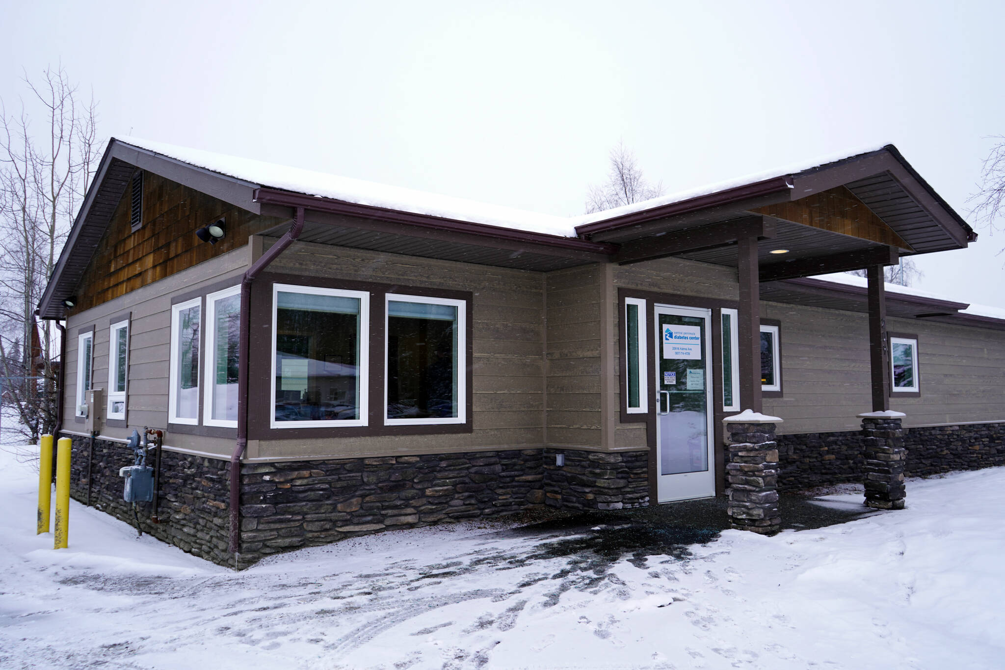 Snow falls atop the Central Peninsula Diabetes Center in Soldotna, Alaska, on Monday, Feb. 26, 2024. The office opened in October, but a grand opening was held this week. (Jake Dye/Peninsula Clarion)