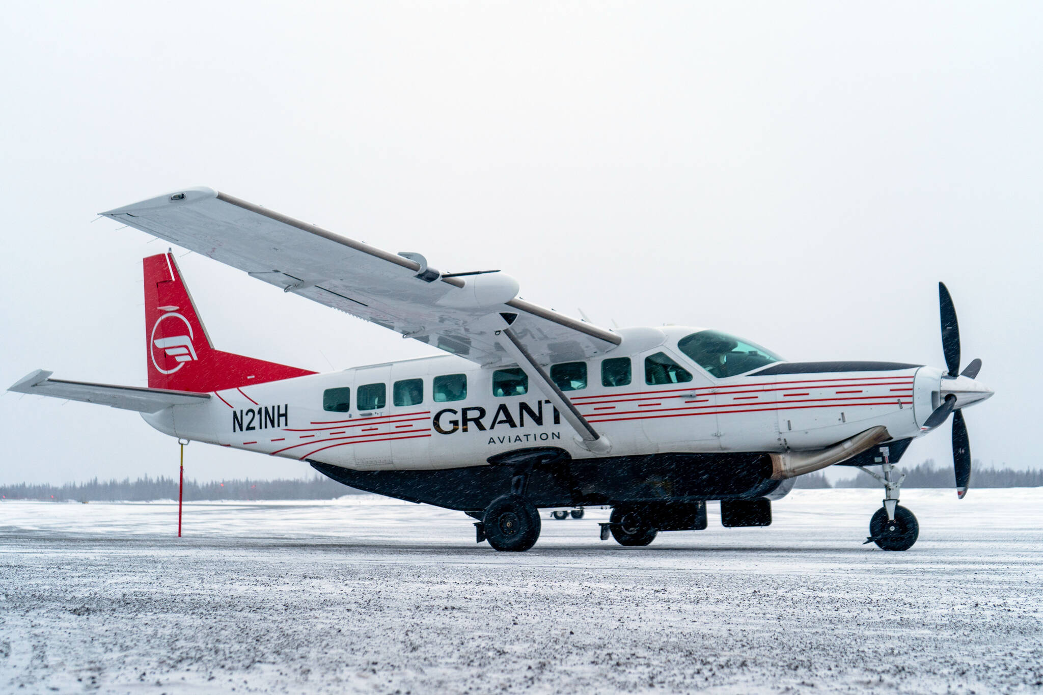 Grant Aviation’s new Cessna 208B EX Grand Caravan idles on the runway moments after arriving at the Kenai Municipal Airport in Kenai, Alaska, on Monday, March 4, 2024. (Jake Dye/Peninsula Clarion)