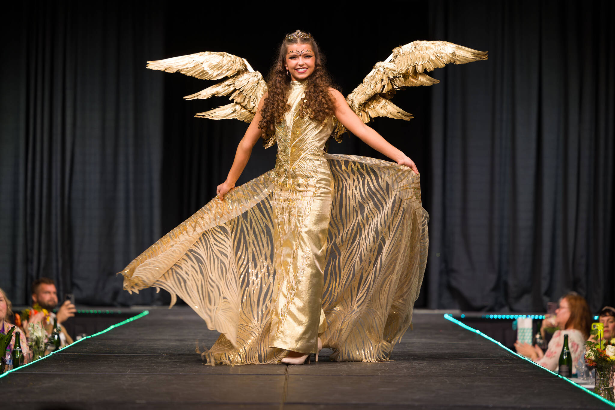 Sara DeVolld wears “Towards the Sun,” a dress she designed that was featured in February’s Trend Alaska 2024 Fashion Show. (Photo provided by Shona DeVolld, by Ondago Photo)