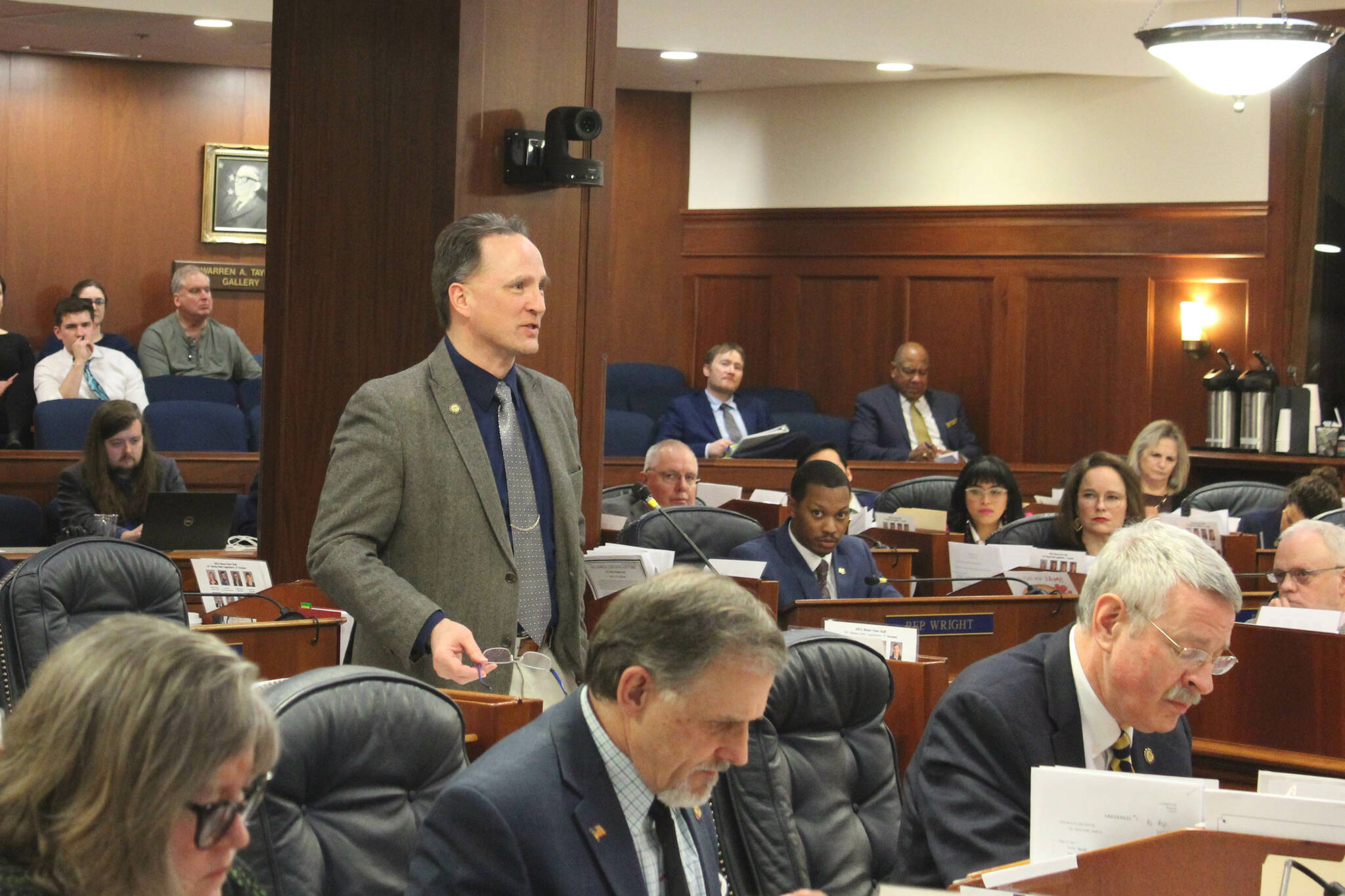 Rep. Ben Carpenter, R-Nikiski, speaks about teacher bonuses during consideration a bill increasing state funds for public education in the Alaska House of Representatives on Thursday, Feb. 22, 2024, in Juneau, Alaska. (Ashlyn O’Hara/Peninsula Clarion)