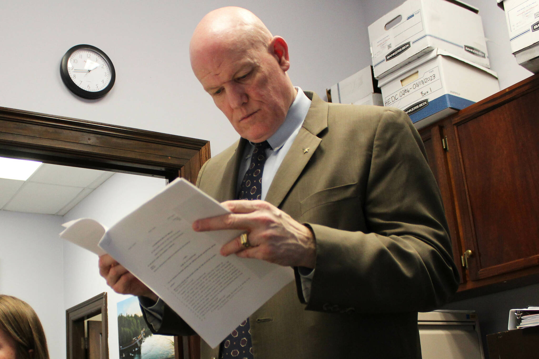 Bud Sexton, chief of staff for Alaska House Rep. Justin Ruffridge, reviews amendment language in their office at the Alaska State Capitol building on Wednesday, March 6, 2024, in Juneau, Alaska. (Ashlyn O’Hara/Peninsula Clarion)