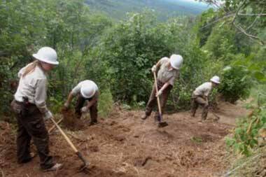 A YCC crew constructs a reroute on Skyline trail. (Photo by USFWS)