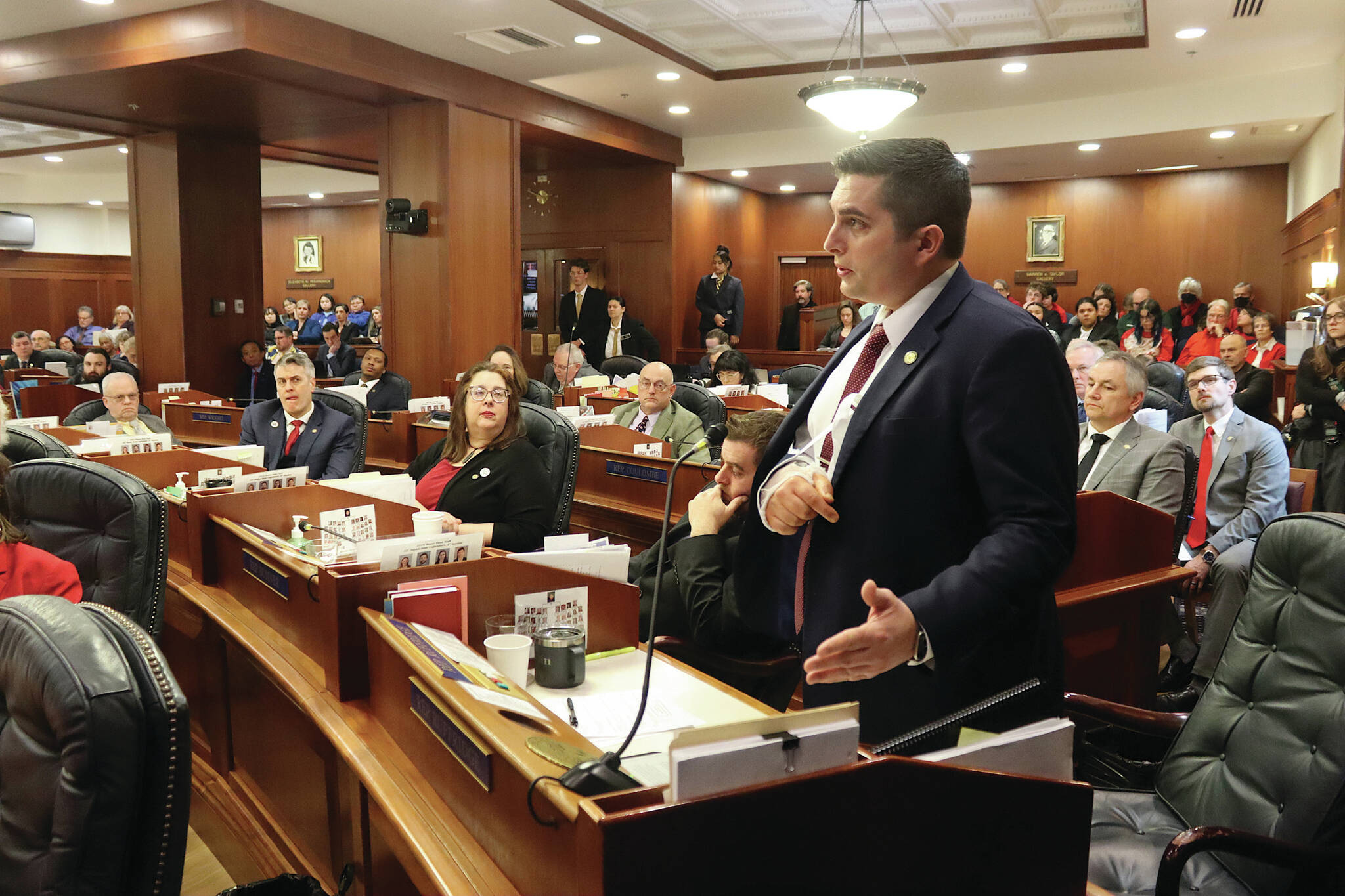 Rep. Justin Ruffridge, a Soldotna Republican who co-chairs the House Education Committee, speaks in favor overriding a veto of Senate Bill 140 during floor debate of a joint session of the Alaska State Legislature on Monday. (Mark Sabbatini/Juneau Empire)