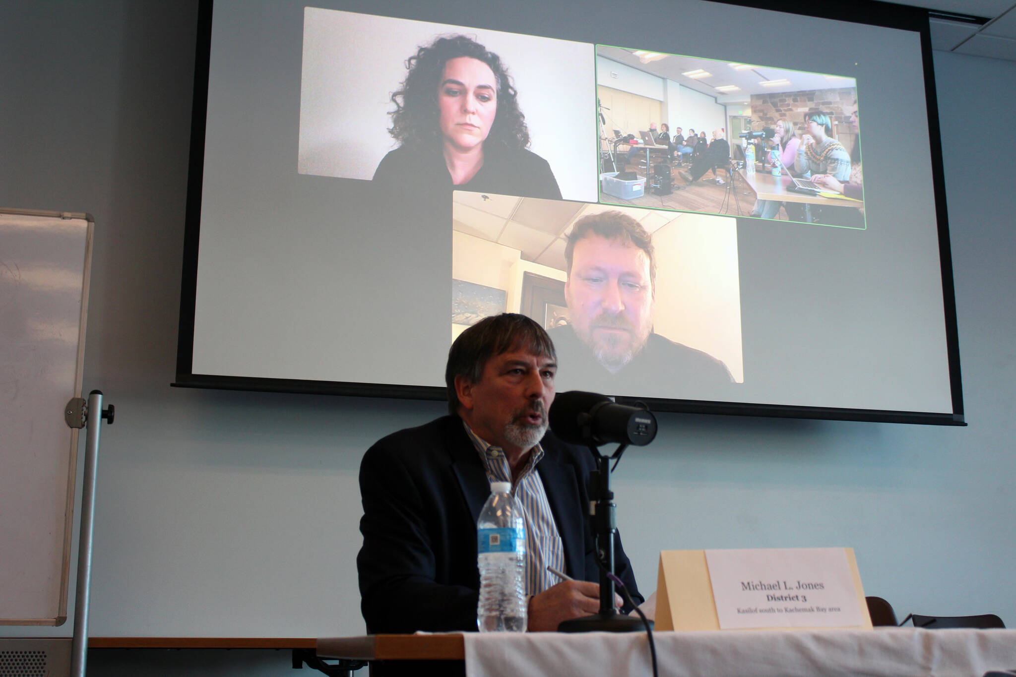 Michael Jones, Louie Flora and Crystal Schwartz participate in a candidate forum for the Homer Electric Association Board of Directors hosted by KDLL 91.9 FM, KBBI AM 890 and the Peninsula Clarion at the Soldotna Public Library in Soldotna, Alaska, on Monday, March 18, 2024. (Jake Dye/Peninsula Clarion)