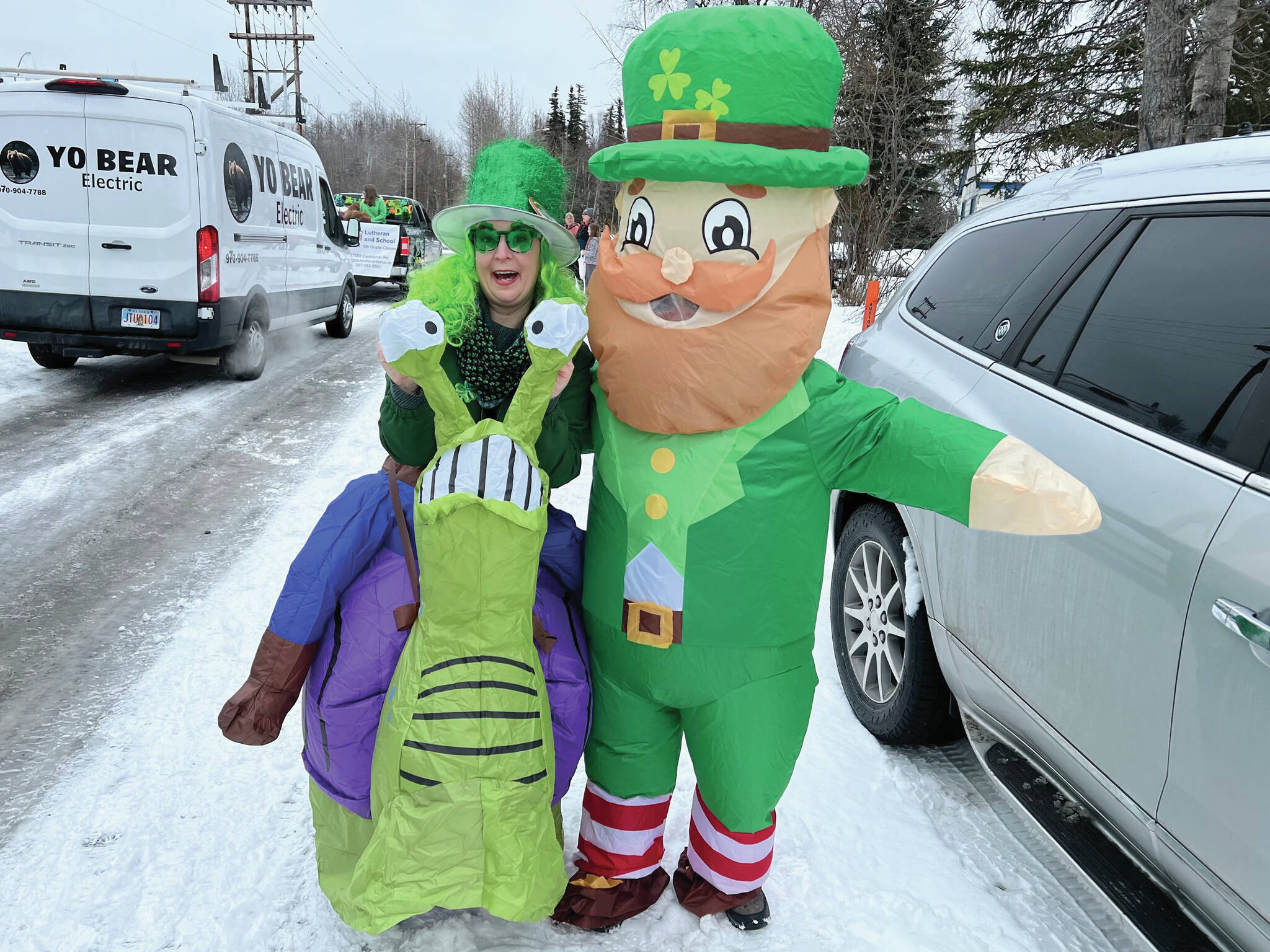 Photo provided by Sara Hondel
Sara Hondel stands with a leprechaun during Sweeney’s St. Patrick’s Day Parade in Soldotna on Sunday. Green, leprechauns and Nugget the Moose poured down the streets for the 34th annual parade hosted by the Soldotna Chamber of Commerce. Under cloudy skies — but fortunately no precipitation — a procession of viridescent celebrants representing businesses and organizations brought festivities to an array of attendees lining the Redoubt Avenue.