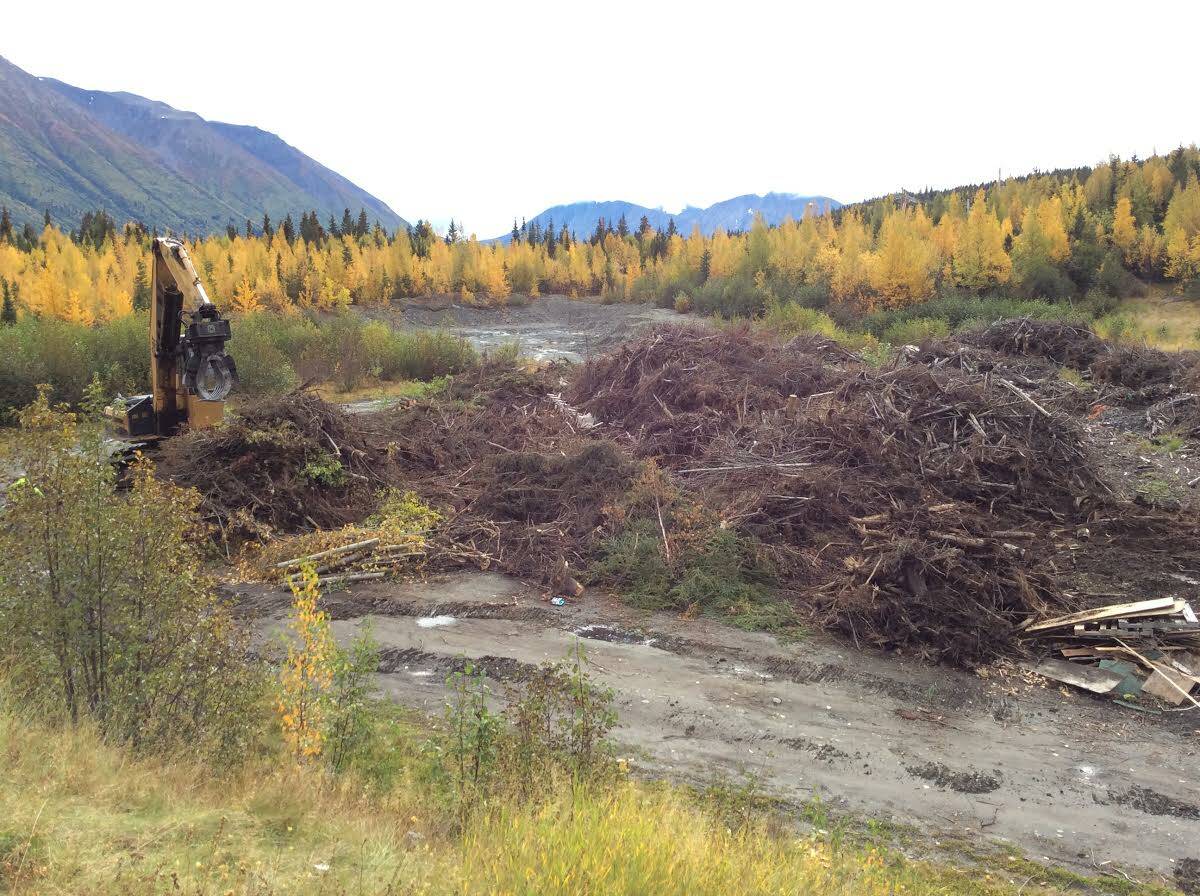 A slash pile containing non-organic construction debris is seen at the Snug Harbor Slash Disposal site on Sept. 22, 2020 in Cooper Landing, Alaska. (Photo courtesy Kenai Peninsula Borough Land Management)