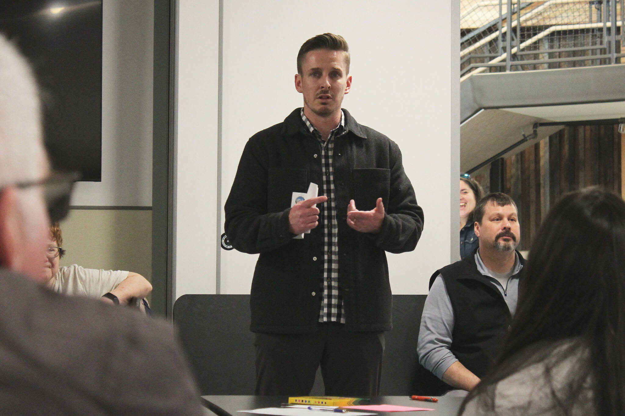 Kyle McFall addresses attendees at a meeting to gauge interest in a Dena’ina-focused charter school hosted by the Kenaitze Indian Tribe on Thursday, March 28, 2024, in Kenai, Alaska. (Ashlyn O’Hara/Peninsula Clarion)