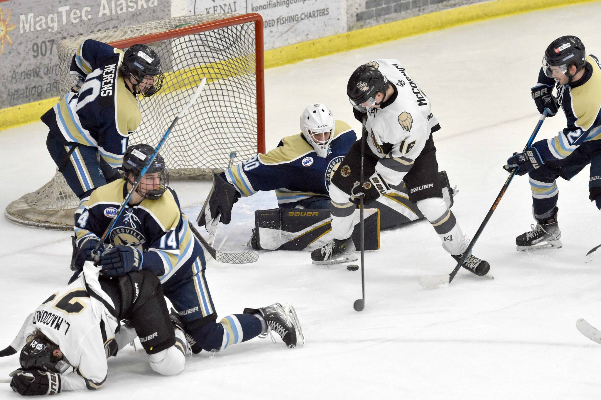 Carter McCormick of the Kenai River Brown Bears can't stuff a goal past Janesville (Wisconsin) Jets goalie Jan Kasal on Sunday, March 31, 2024, at the Soldotna Regional Sports Complex in Soldotna, Alaska. (Photo by Jeff Helminiak/Peninsula Clarion)