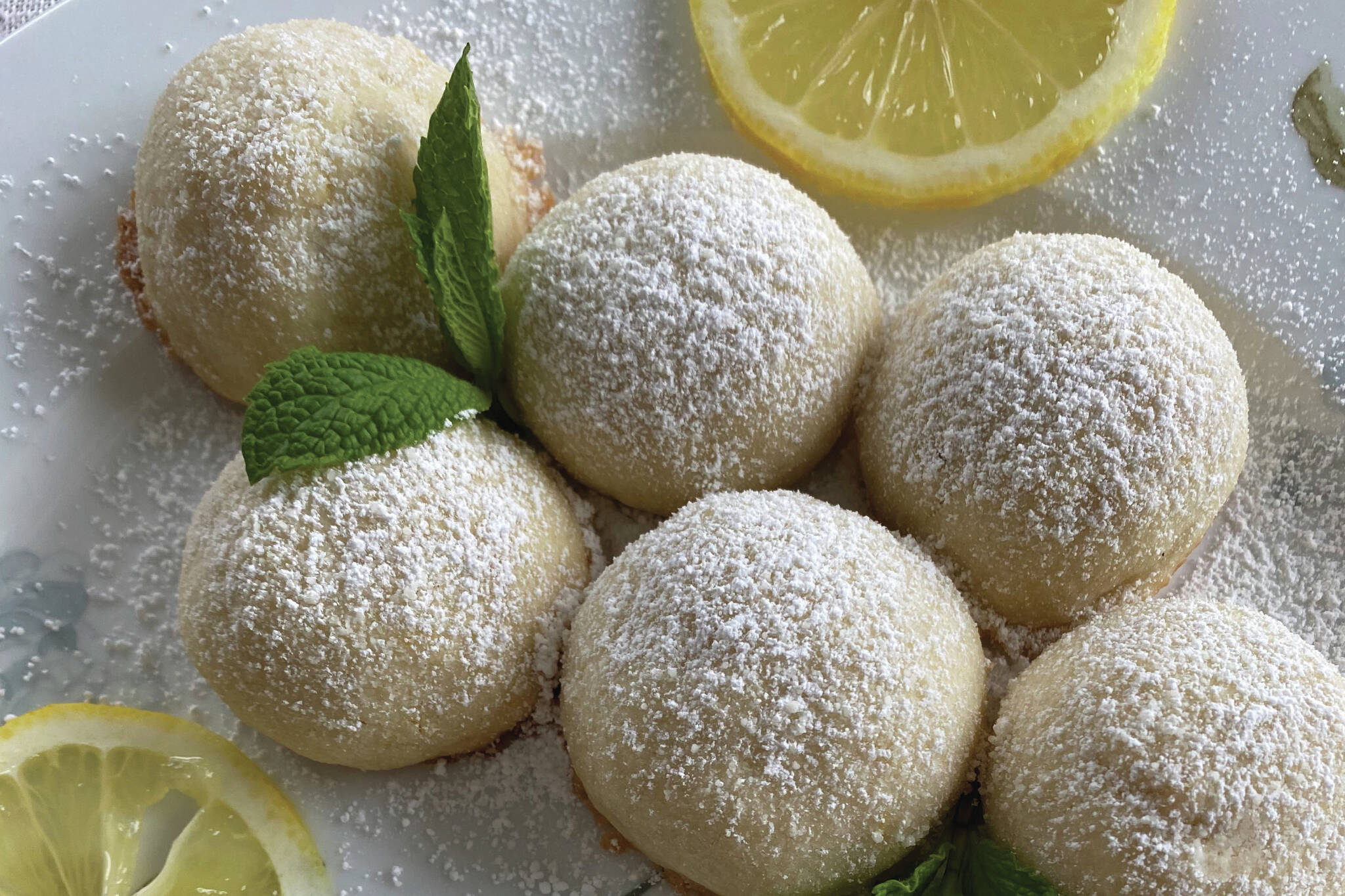 These simple lemon almond snowball cookies are mildly sweet and delicate. (Photo by Tressa Dale/Peninsula Clarion)