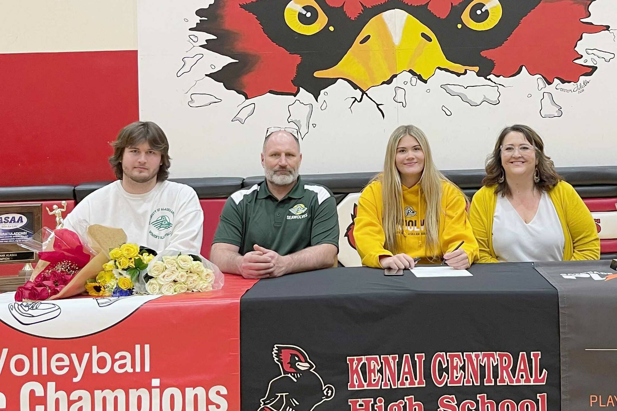 Hunter Beck, Dan Beck, Emma Beck and Tracie Beck sit at Kenai Central High School in Kenai, Alaska, on Wednesday, April 3, 2024, as Emma signs a National Letter of Intent to play volleyball at the University of Alaska Anchorage. Hunter is Emma's brother, Dan is Emma's father and Tracie is Emma's mother and the head volleyball coach. (Photo provided)