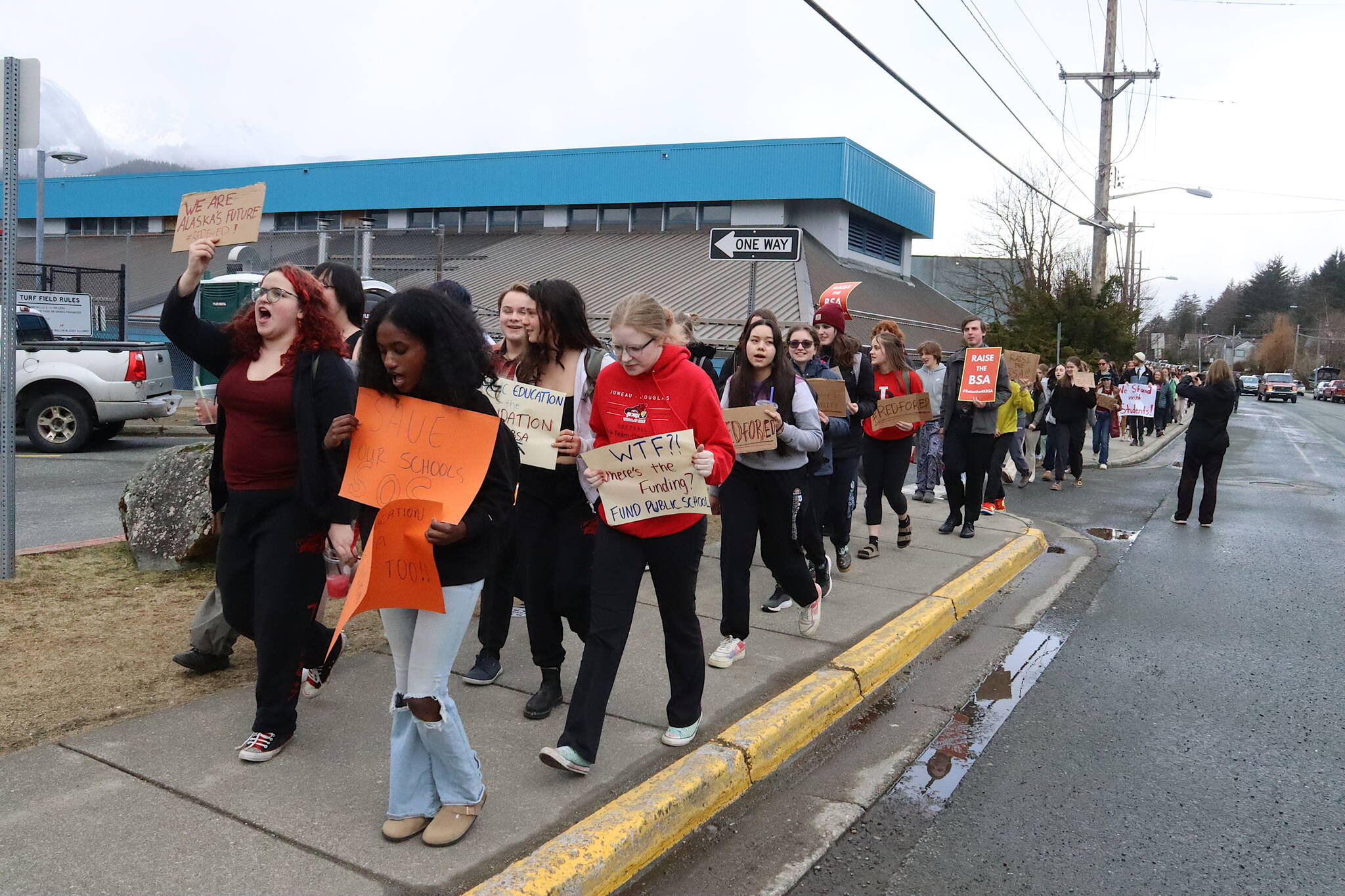 Juneau-Douglas High School: Yadaa.at Kalé students, along with a handful of state legislators and staff members, march from the school to the Alaska State Capitol on Thursday morning to protest lawmakers who earlier this year rejected an increase in the state’s funding formula for public schools. (Mark Sabbatini / Juneau Empire)