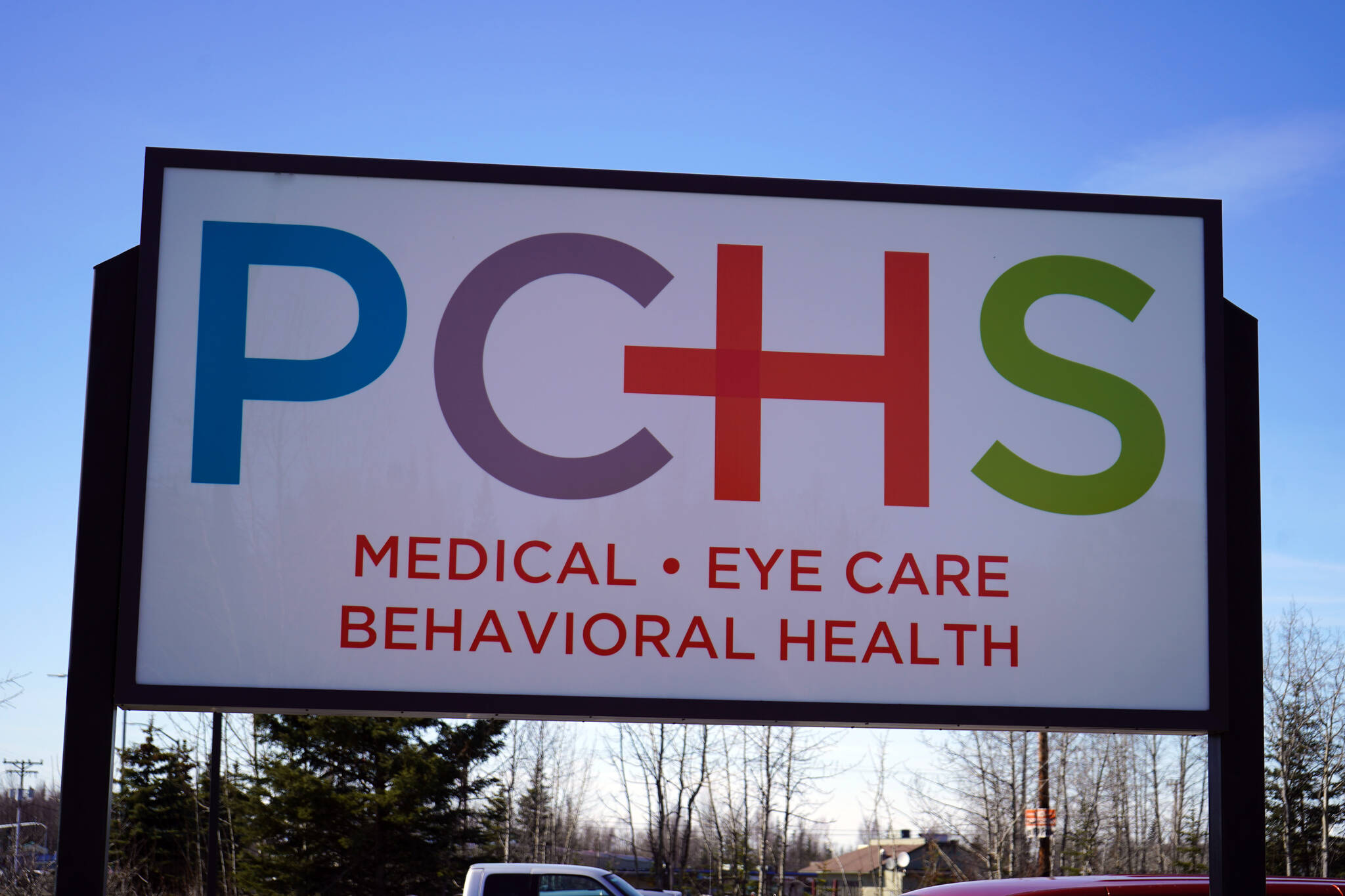 A sign for Peninsula Community Health Services stands outside their facility in Soldotna, Alaska, on Monday, April 15, 2024. (Jake Dye/Peninsula Clarion)