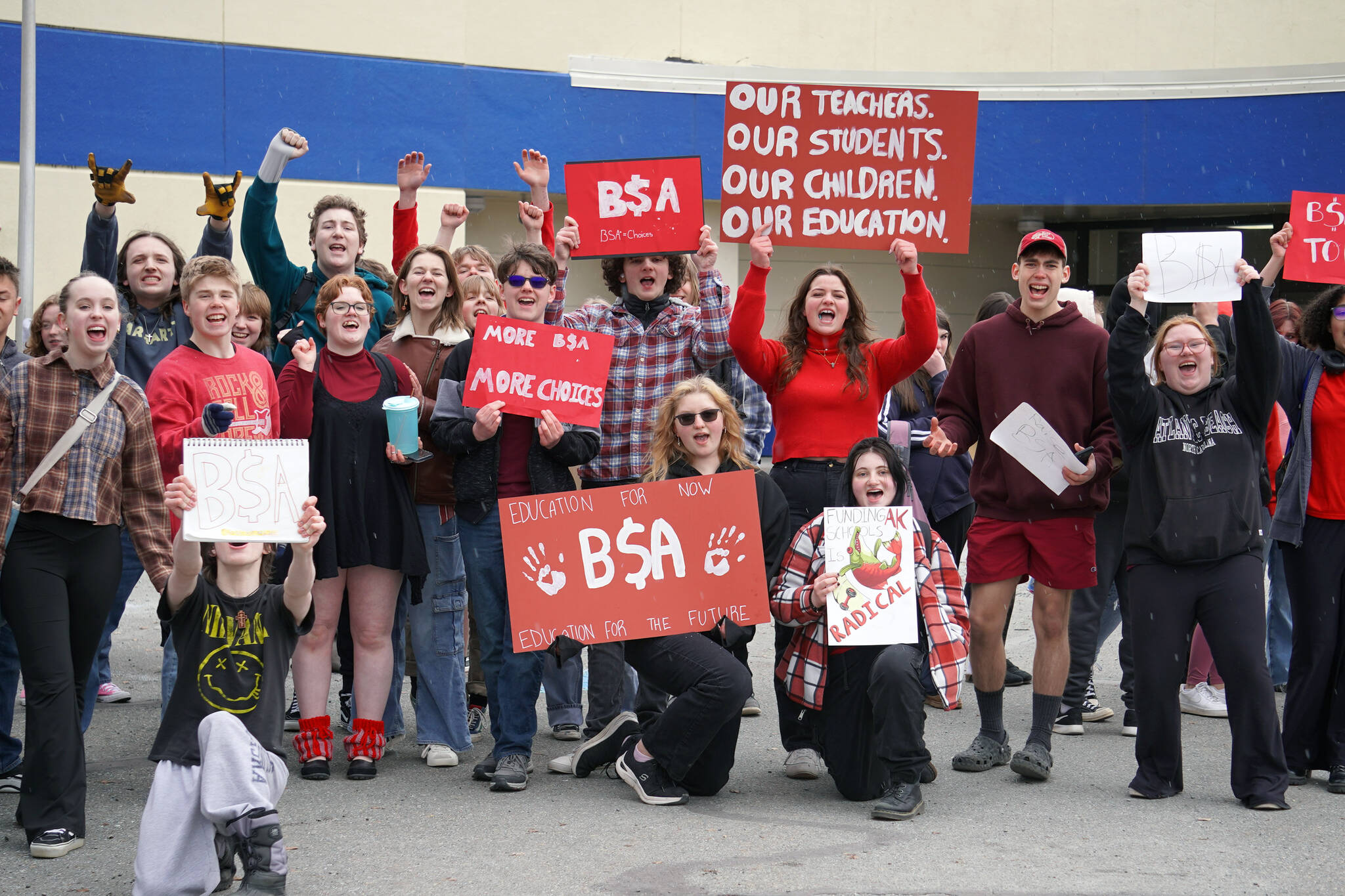 Students of Soldotna High School stage a walkout in protest of the veto of Senate Bill 140 in front of their school in Soldotna, Alaska, on Wednesday, April 17, 2024. (Jake Dye/Peninsula Clarion)