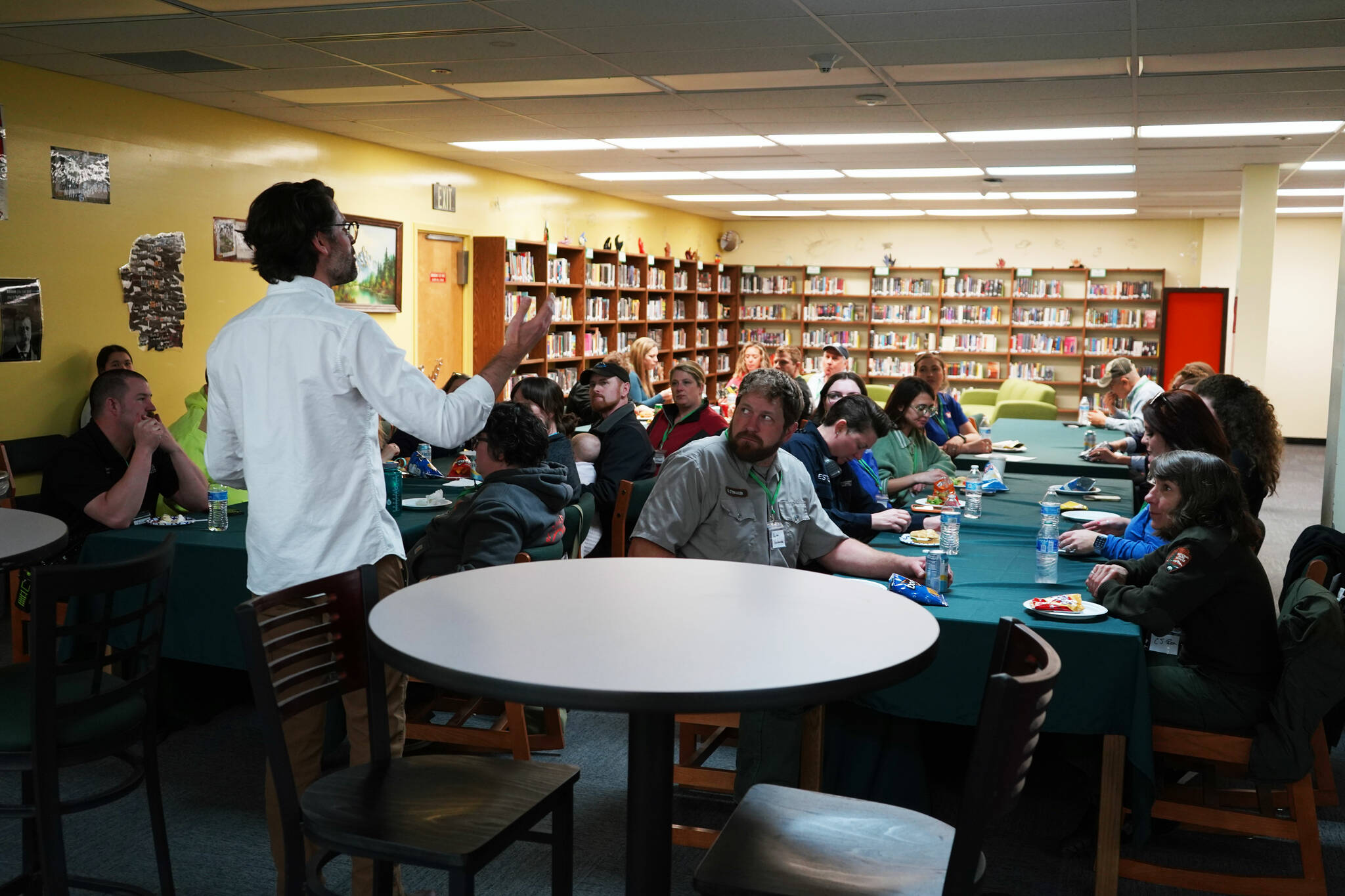 Jonathan Le Shana, Student Success Liaison, greets roughly two dozen representatives of Kenai Peninsula businesses ahead of the start of Career Day at Seward High School in Seward, Alaska, on Wednesday, April 24, 2024. (Jake Dye/Peninsula Clarion)