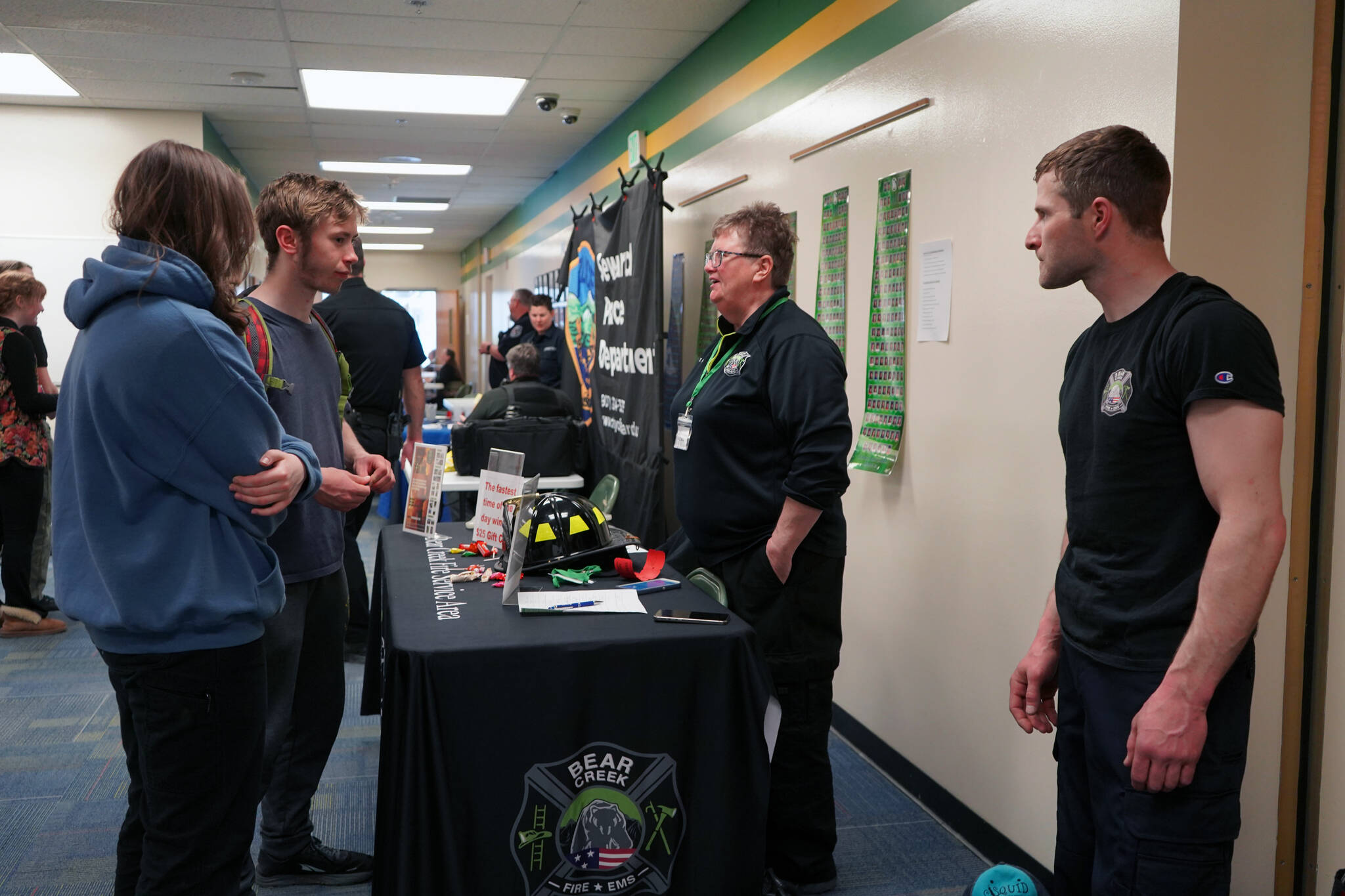 Jake Dye/Peninsula Clarion
Oliver Trobaugh speaks to representatives of Bear Creek Volunteer Fire Department during Career Day at Seward High School in Seward on Wednesday.