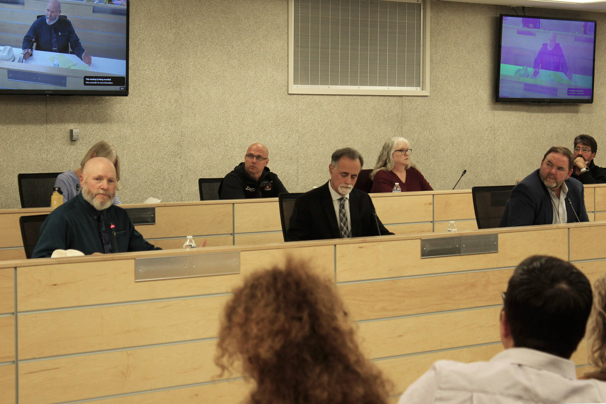 From front left, Connections Homeschool Principal Doug Hayman, Kenai Peninsula Borough Mayor Peter Micciche and KPBSD Superintendent Clayton Holland listen to families during a community conversation on Thursday, Oct. 5, 2023, in Soldotna, Alaska. (Ashlyn O’Hara/Peninsula Clarion)