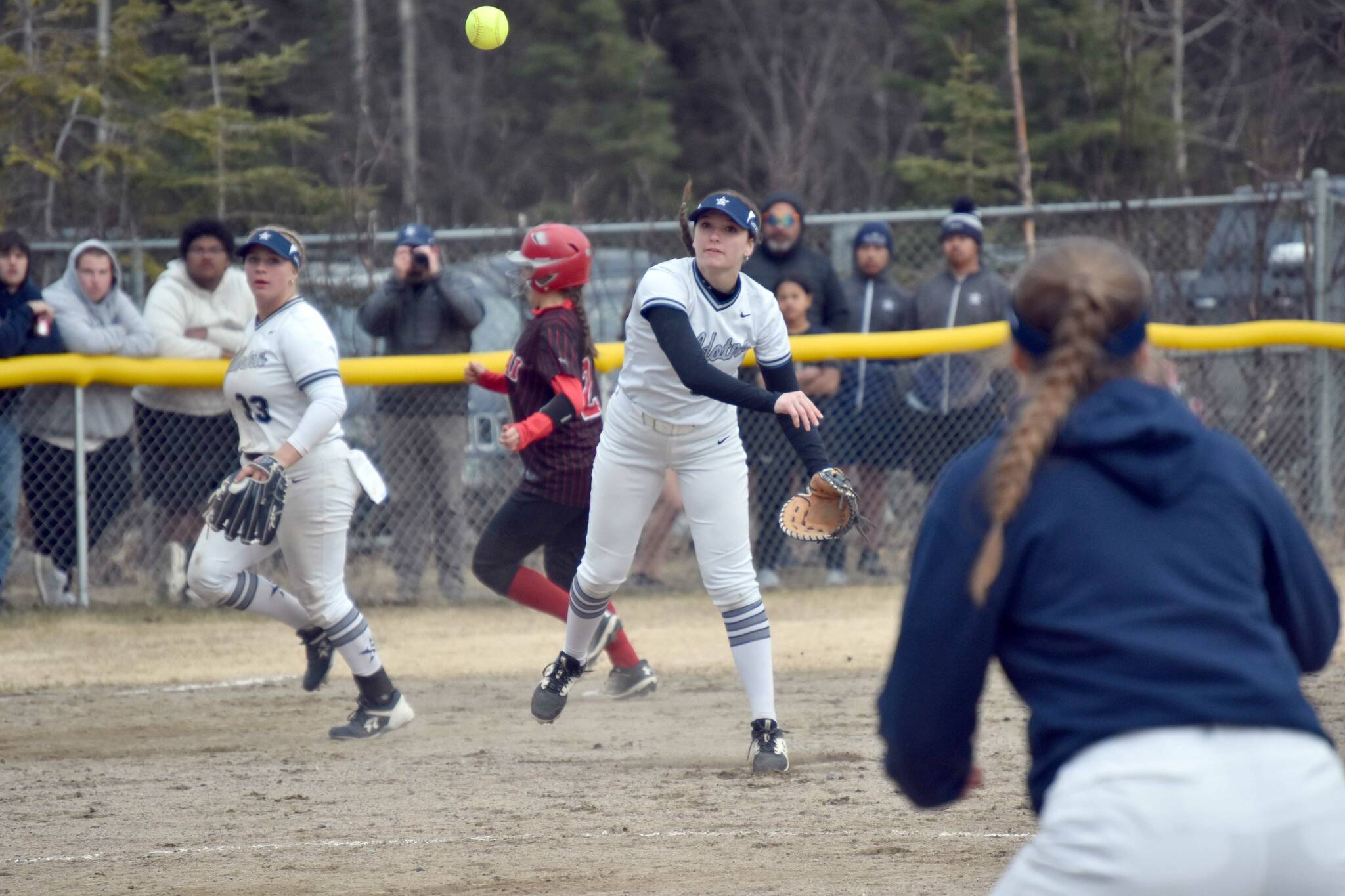Soldotna third baseman Juliet Innes throws to first Tuesday, April 30, 2024, at the Soldotna Little League fields in Soldotna, Alaska. (Photo by Jeff Helminiak/Peninsula Clarion)