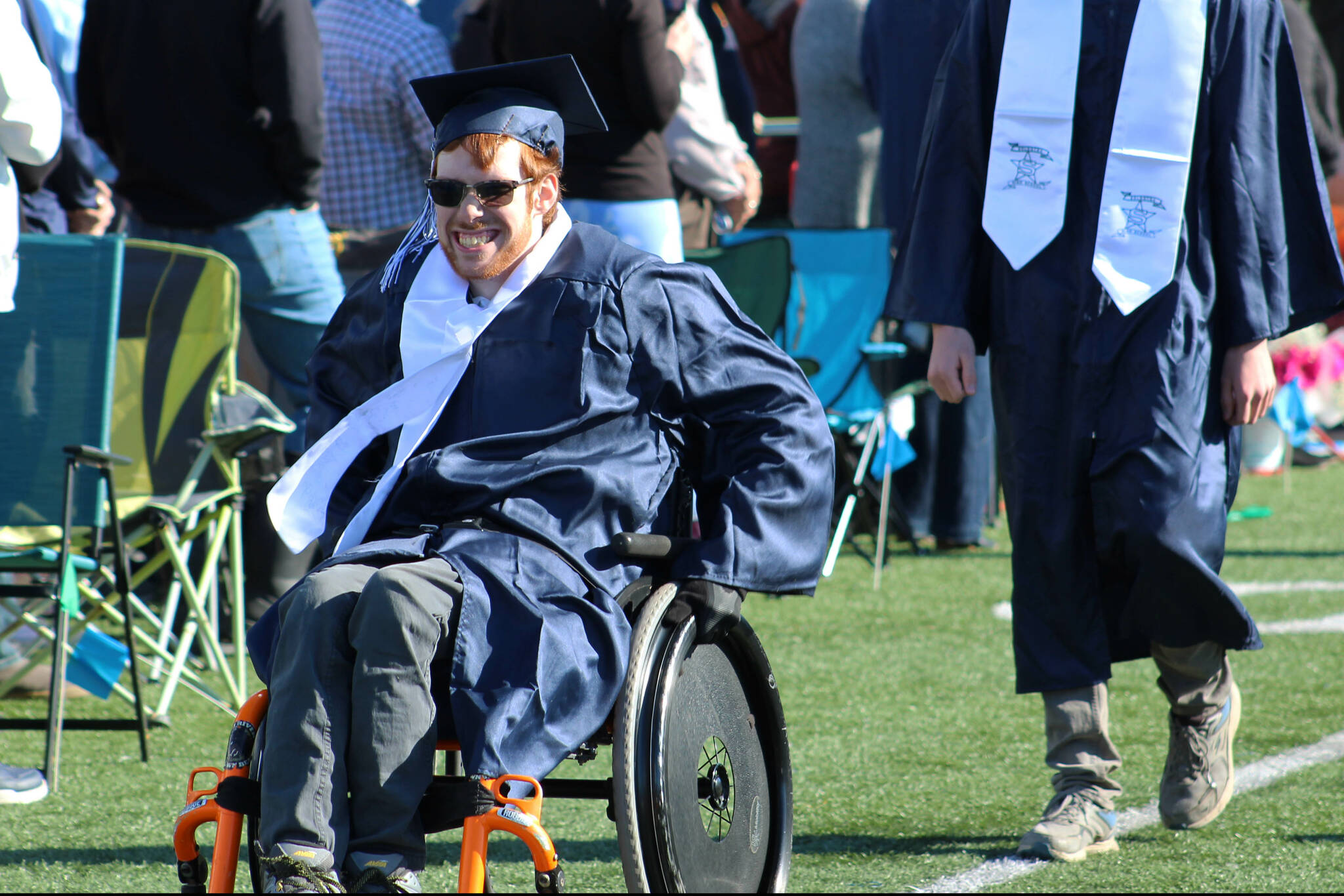 Graduate Coen Braxling enters Soldotna High School’s commencement ceremony on Tuesday, May 14, 2024, in Soldotna, Alaska. (Ashlyn O’Hara/Peninsula Clarion)