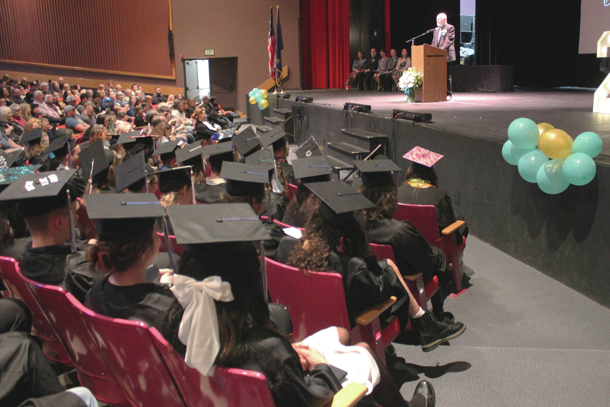 Graduates listen to Connections Homeschool Principal Doug Hayman speak during the school’s commencement ceremony on Thursday in Soldotna. (Ashlyn O’Hara/Peninsula Clarion)
Graduates listen to Connections Homeschool Principal Doug Hayman speak during the school’s commencement ceremony on Thursday, May 16, 2024 in Soldotna, Alaska. (Ashlyn O’Hara/Peninsula Clarion)