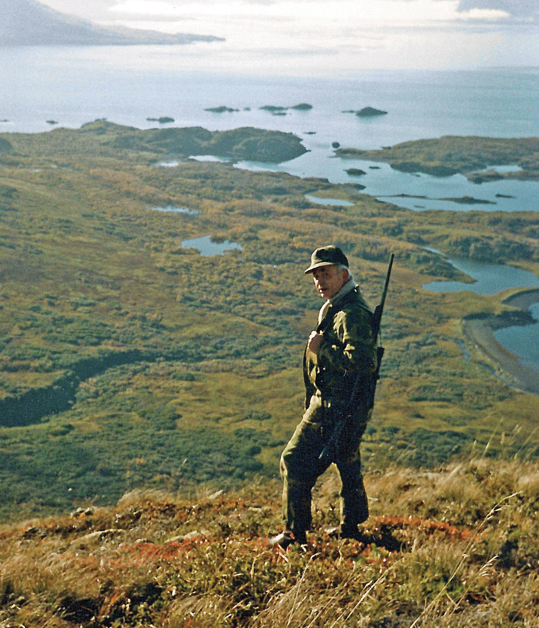 Calvin Fair, in his element, on Buck Mountain, above Chief Cove on Kodiak Island, in October 1986. His hunting partner and longtime friend Will Troyer captured this image while they were on one of the duos annual deer-hunting trips. (Photo courtesy of the Fair Family Collection)