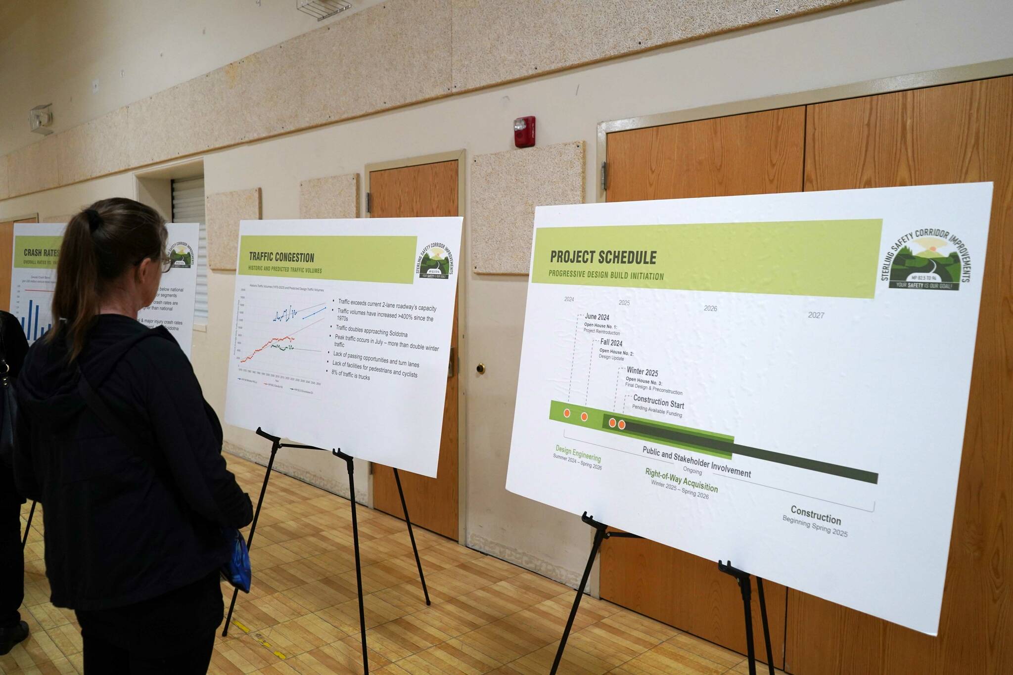 Large boards display information about the Sterling Safety Corridor Improvements project during a town hall event at the Sterling Community Center in Sterling, Alaska, on Tuesday, June 25, 2024. (Jake Dye/Peninsula Clarion)