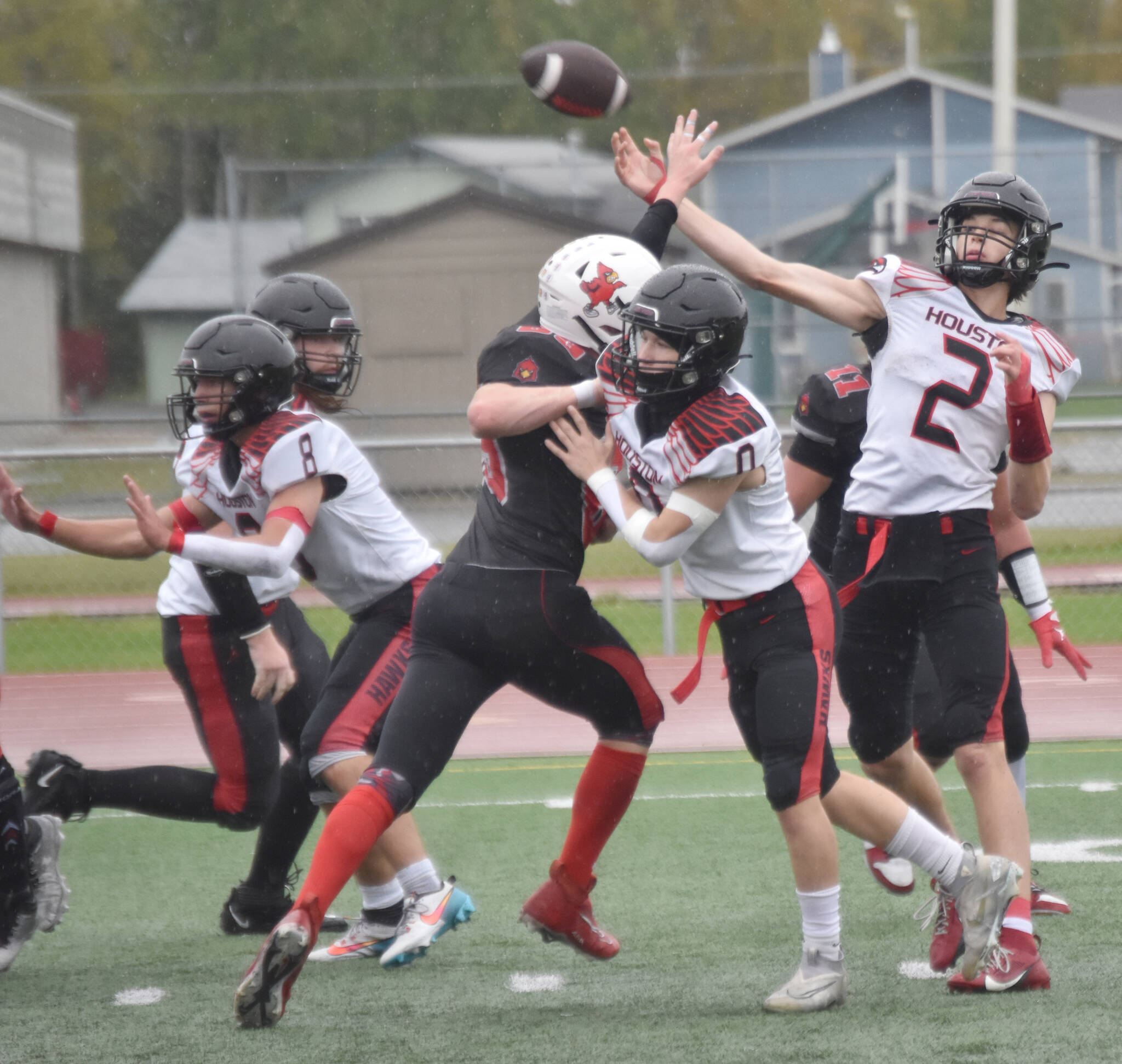 Houstons Blake Baskett cuts loose a pass Saturday, Sept. 14, 2024, at Ed Hollier Field at Kenai Central High School in Kenai, Alaska. (Photo by Jeff Helminiak/Peninsula Clarion)