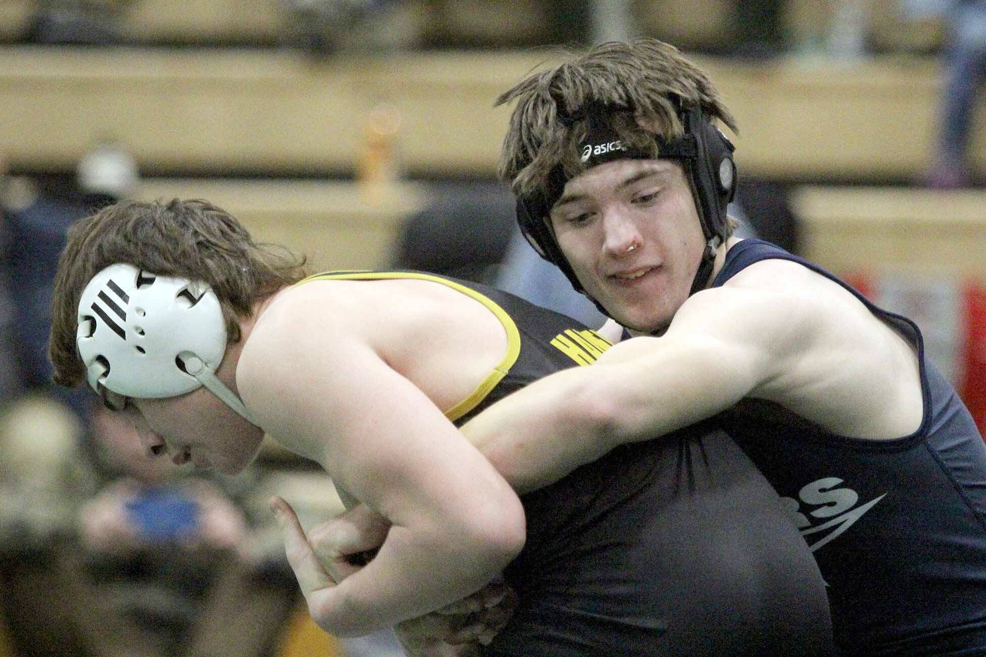 Soldotna’s Ryan Buchanan maintains a hold of Quentin Halverson during the Colony Invitational on Saturday, Nov. 23, 2024, at Colony High School in Palmer. (Photo by Jeremiah Bartz/Frontiersman)