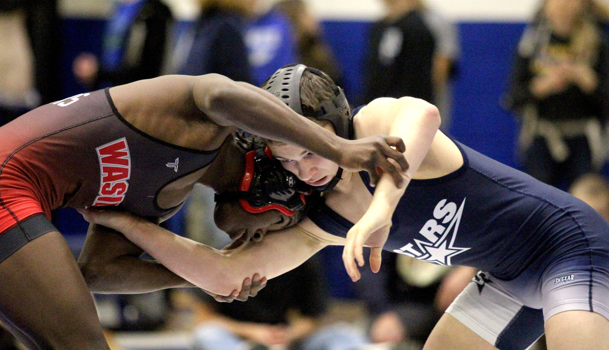 Wasilla’s Achillies Alexander and Soldotna’s Carson Cobb met in the boys 130-pound final of the Northern Lights Conference Championships on Saturday, Dec. 14, 2024, at Palmer High School in Palmer, Alaska. (Photo by Jeremiah Bartz/Frontiersman)