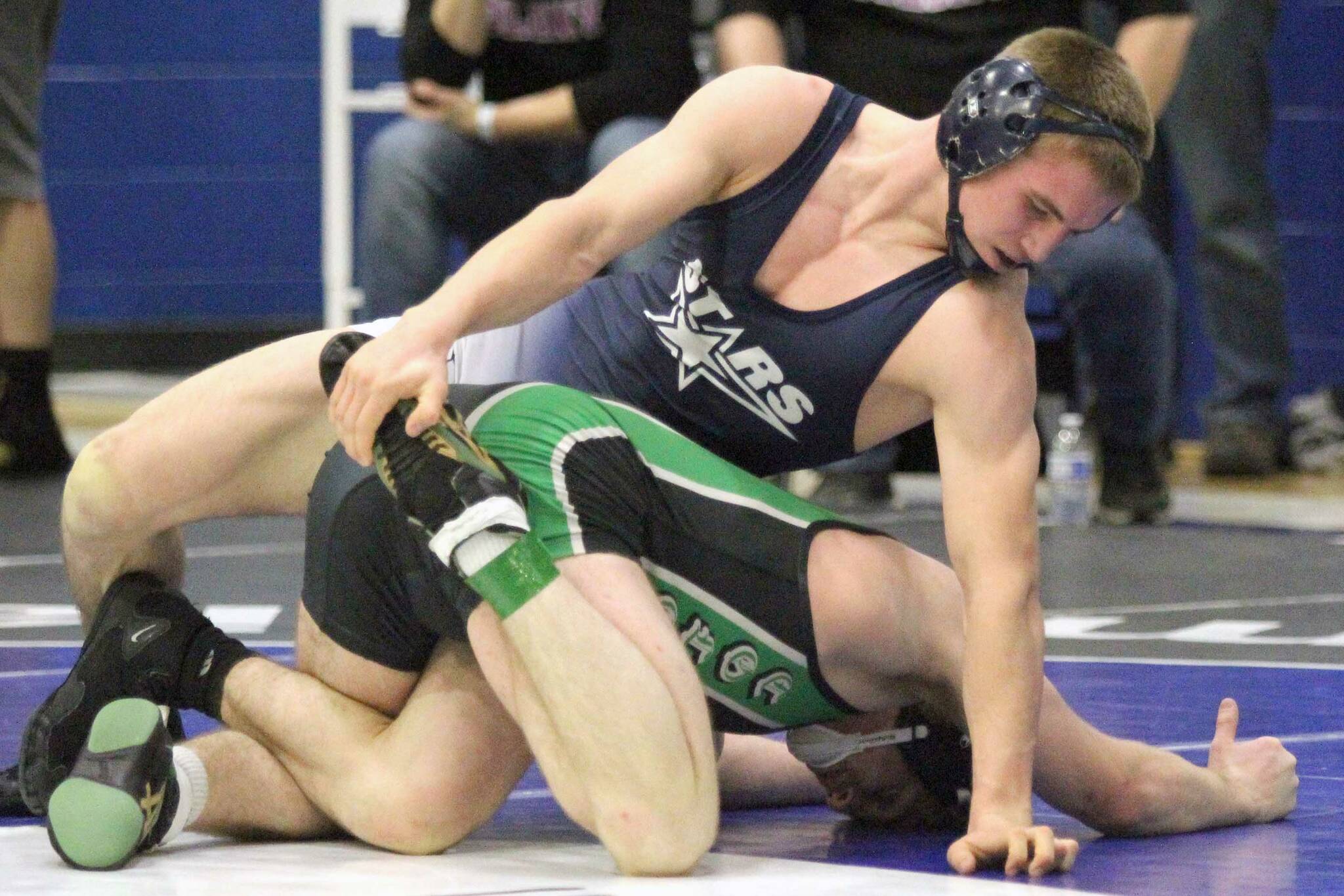 Soldotnaճ Michael Dickinson controls the leg of Colonyճ Tristen Mayer during the 152-pound final of the Northern Lights Conference Championships on Saturday, Dec. 14, 2024, at Palmer High School in Palmer, Alaska. (Photo by Jeremiah Bartz/Frontiersman)