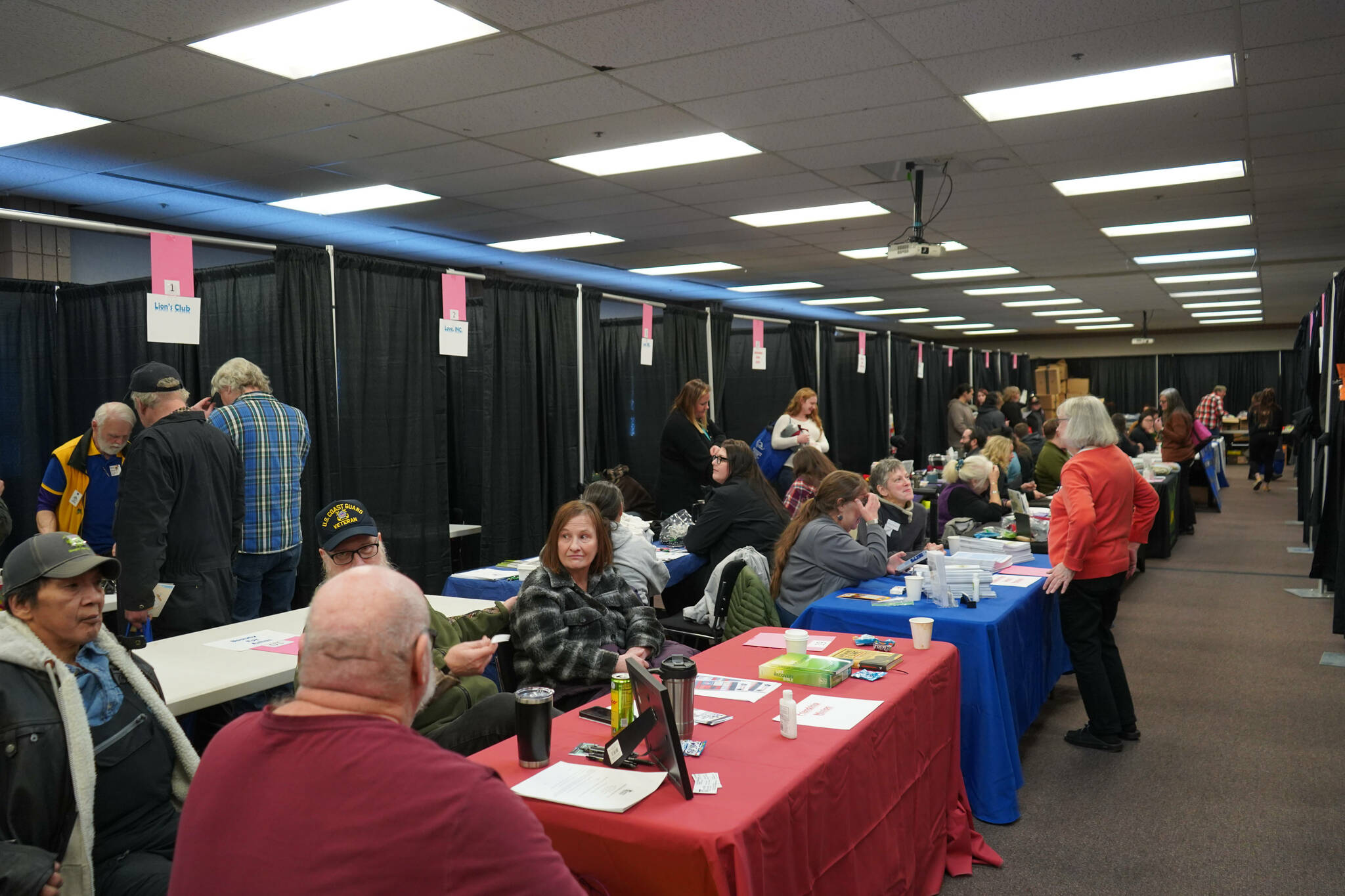 Dozens of booths and vendors offering services fill the 14th Annual Project Homeless Connect at the Soldotna Regional Sports Complex in Soldotna, Alaska, on Tuesday, Jan. 28, 2025. (Jake Dye/Peninsula Clarion)