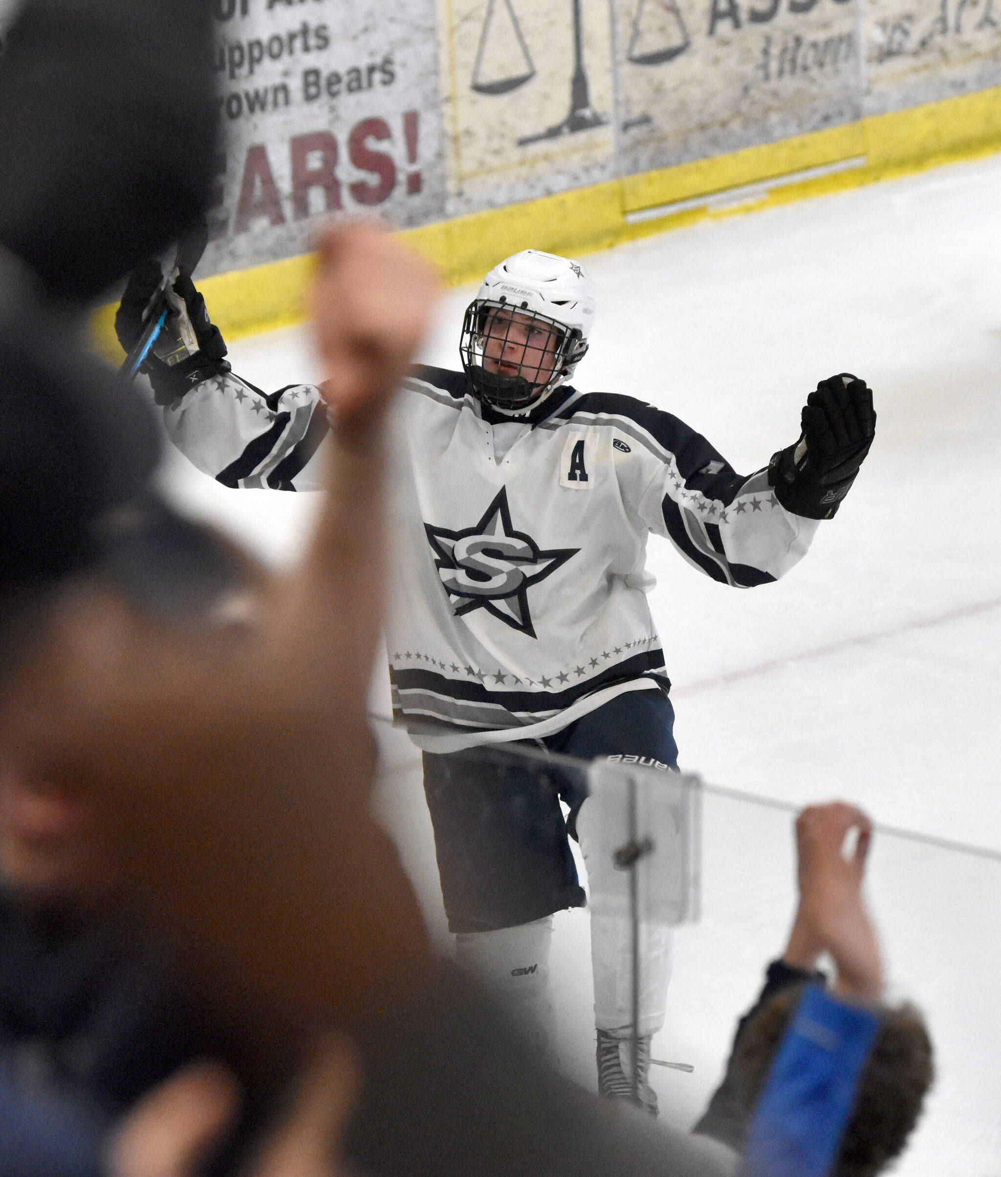 Soldotna’s Noah Crabtree celebrates the game-winning goal in overtime Friday, Feb. 7, 2025, at the First National Cup Division II state hockey tournament at the Soldotna Regional Sports Complex in Soldotna, Alaska. (Photo by Jeff Helminiak/Peninsula Clarion)
