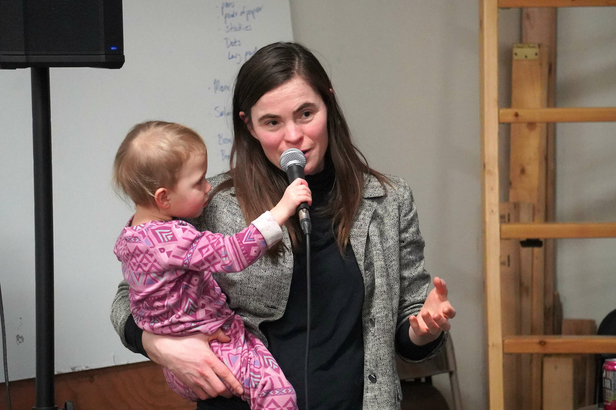 Cook Inletkeeper Regional Director Kaitlin Vadla speaks during a Local Solutions meeting focused on salmon at the Cook Inletkeeper Community Action Studio in Soldotna, Alaska, on Monday, Feb. 10, 2025. (Jake Dye/Peninsula Clarion)