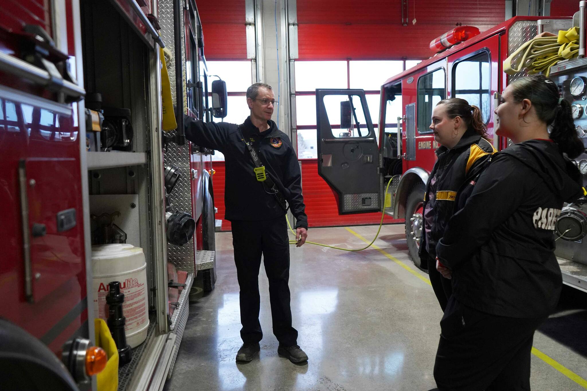 Fire Marshal Jeremy Hamilton gives a tour to students during Job Shadow Day at Kenai Fire Department in Kenai, Alaska, on Wednesday, Feb. 19, 2025. (Roddy Craig/Peninsula Clarion)
