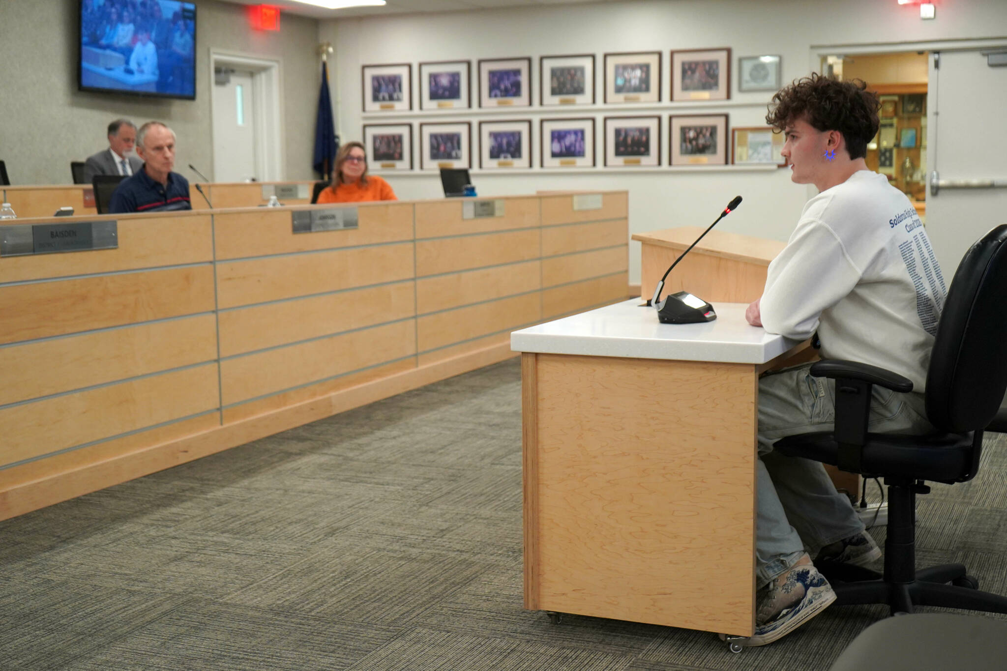 Eli Bouschor, a student at Soldotna High School, speaks during a meeting of the Kenai Peninsula Borough Assembly in Soldotna, Alaska, on Tuesday, Feb. 25, 2025. (Jake Dye/Peninsula Clarion)
