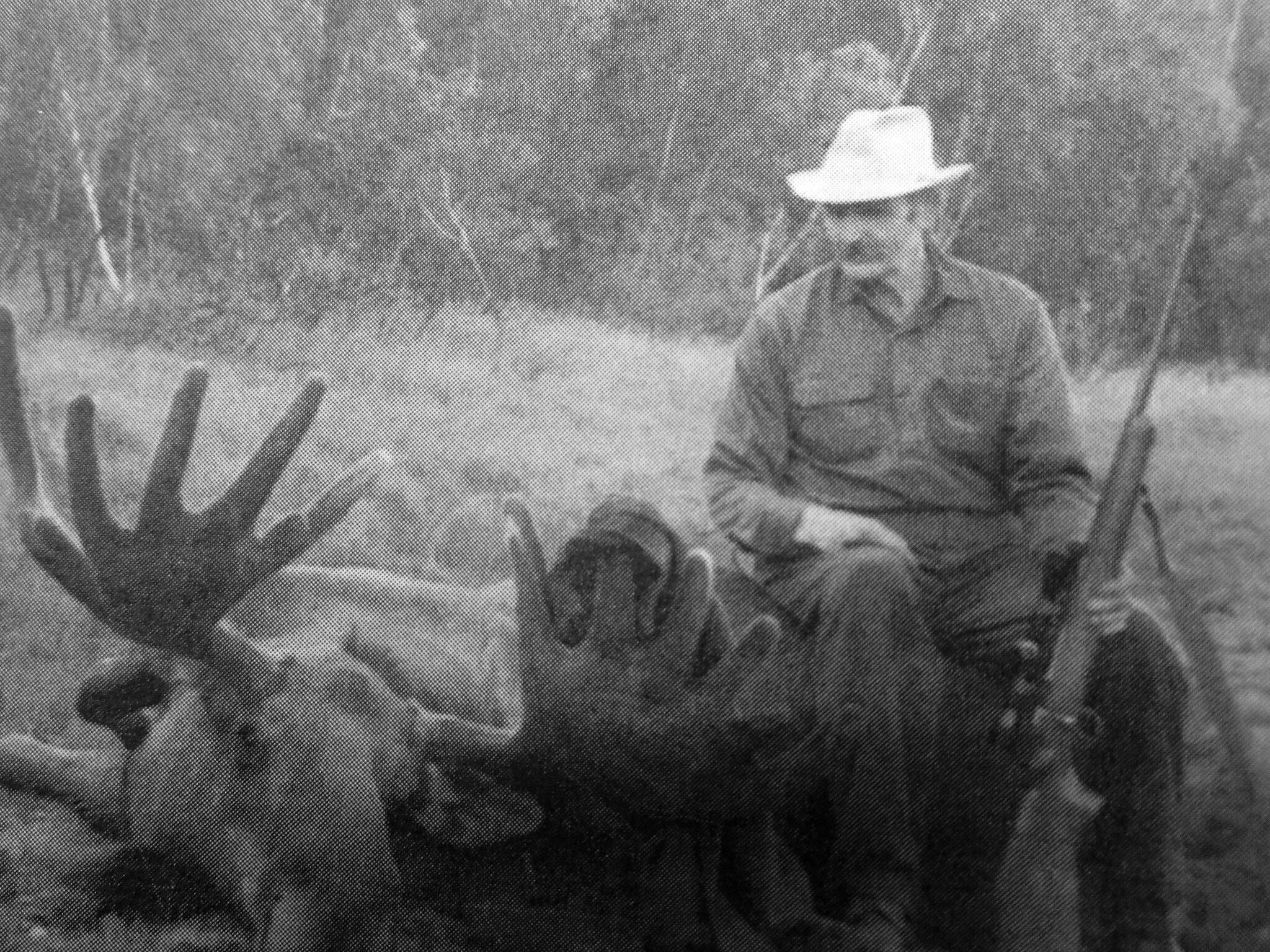 Photo from “In Those Days: Alaska Pioneers of the Lower Kenai Peninsula, Vol. II”
Clarence Hiram “Poopdeck” Platt sits atop a recent moose kill.
