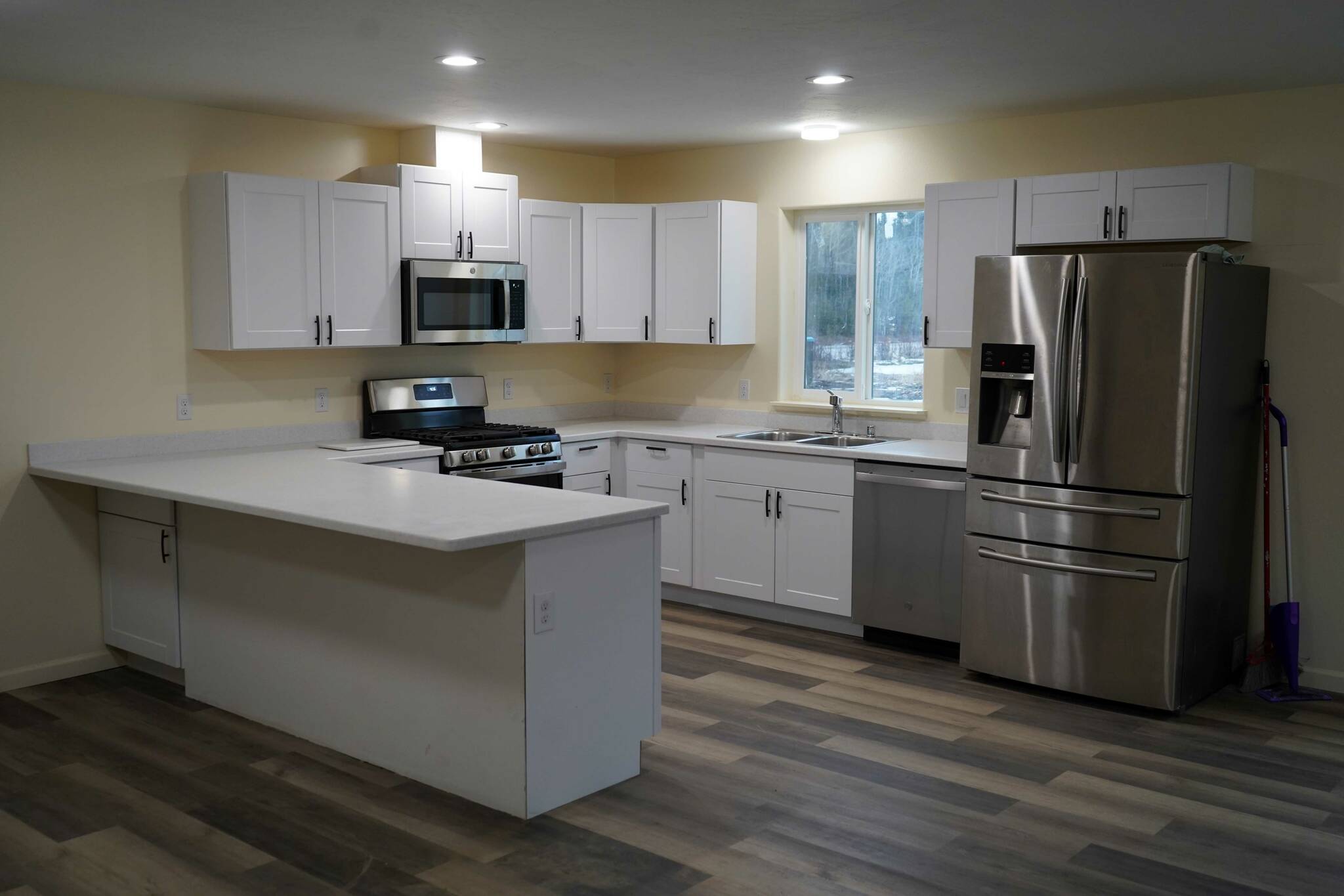 A home constructed as part of the Rural Alaska Community Action Program’s Mutual Self-Help Housing Program is seen at a celebration of more than 100 homes constructed by RurAL CAP near Soldotna, Alaska, on Thursday, Feb. 27, 2025. (Jake Dye/Peninsula Clarion)