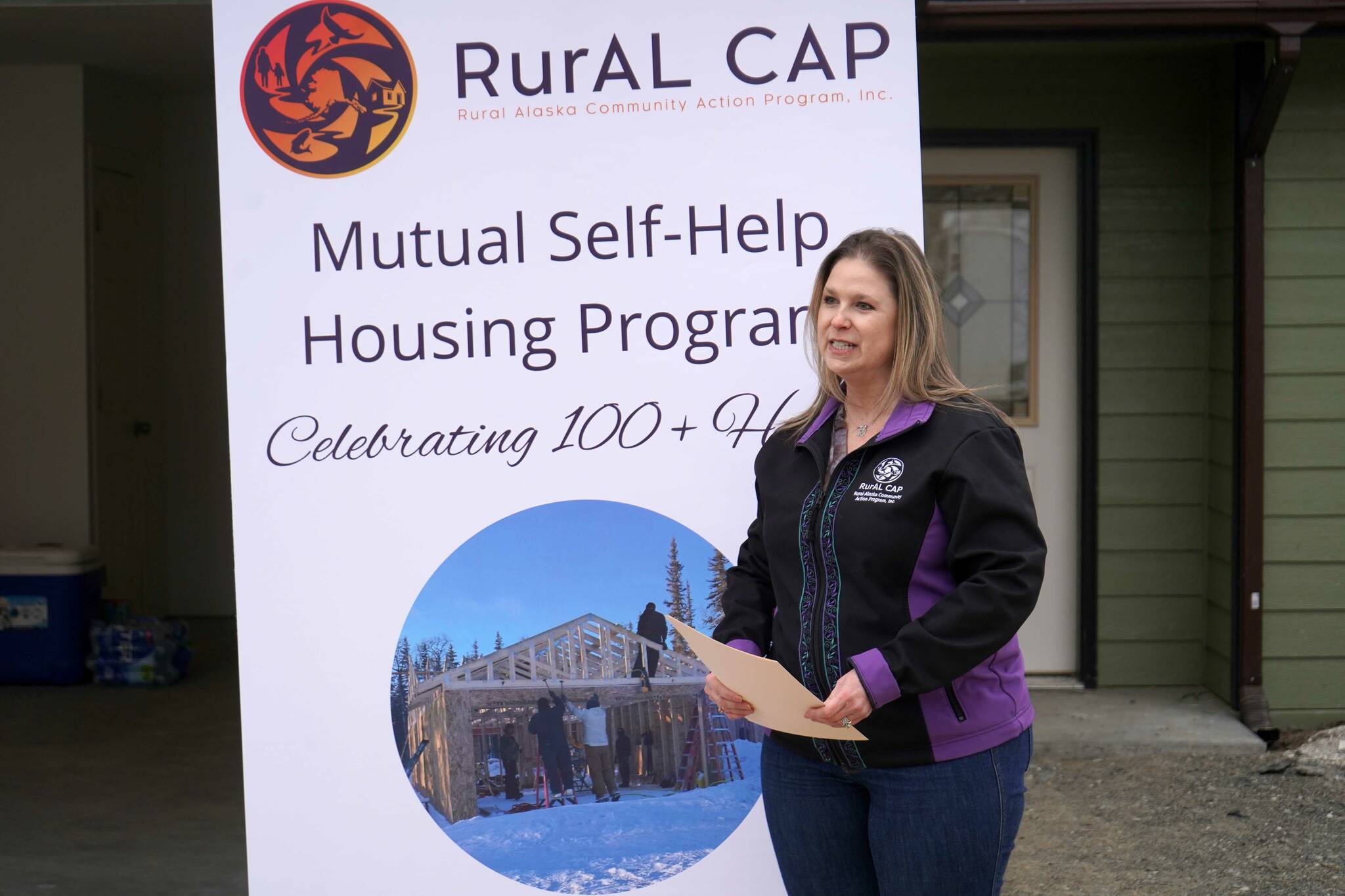 Mi’shell French, director of rural housing for the Rural Alaska Community Action Program, speaks at a celebration of more than 100 homes constructed by RurAL CAP’s Mutual Self-Help Housing Program near Soldotna, Alaska, on Thursday, Feb. 27, 2025. (Jake Dye/Peninsula Clarion)