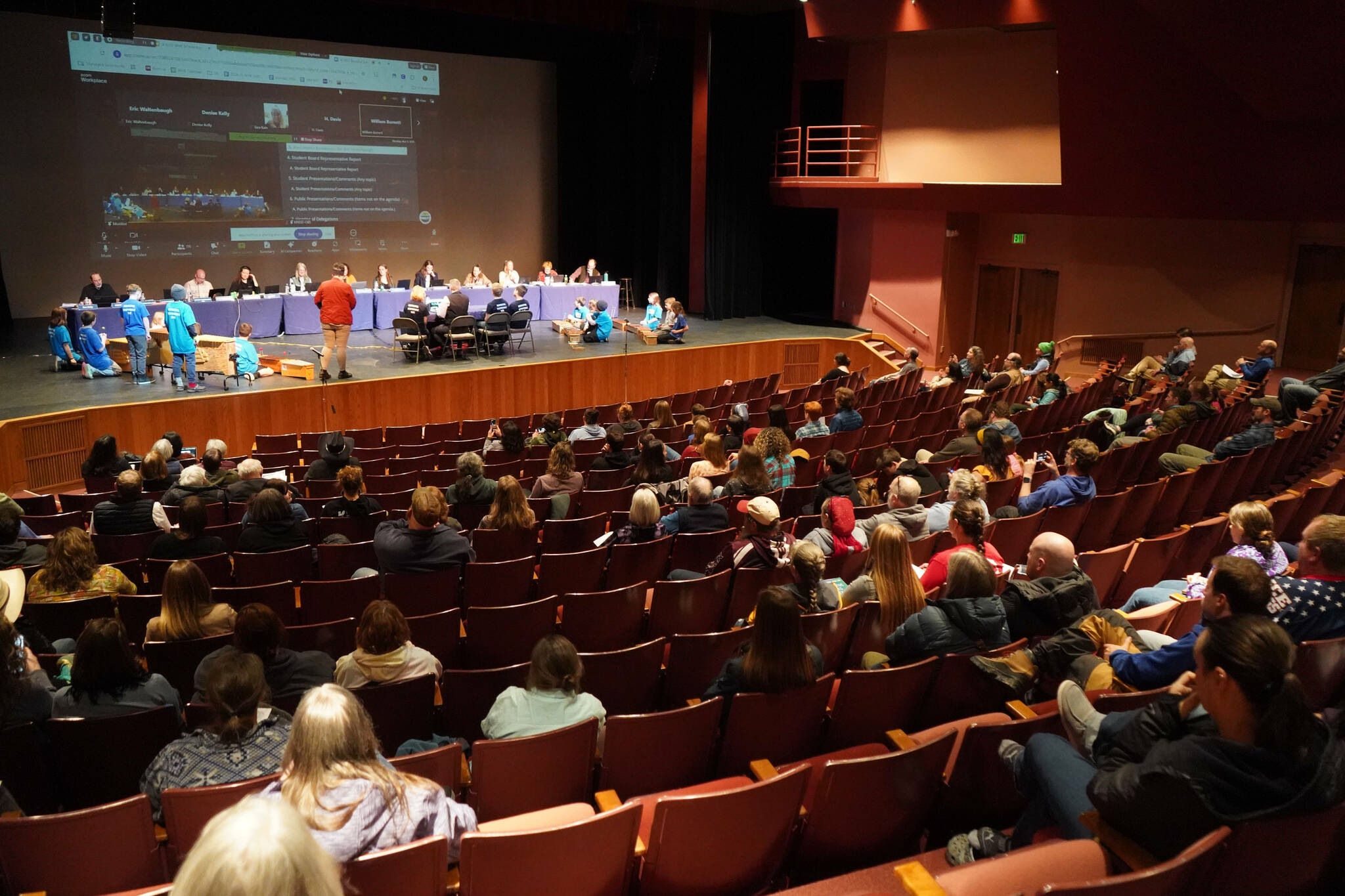 Around 100 people fill seats during a meeting of the Kenai Peninsula Borough School District’s Board of Education in Homer, Alaska, on Monday, March 3, 2025. (Jake Dye/Peninsula Clarion)