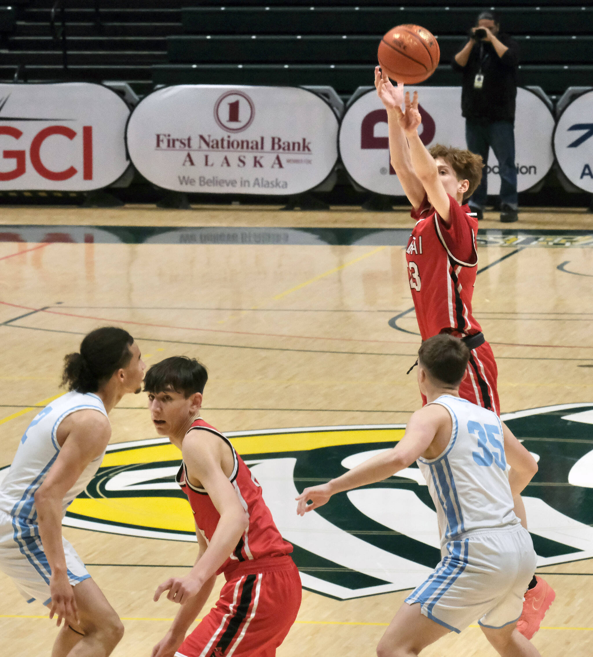 Kenai’s Caleb Litke (23) shoots over Valdez’s Zachary Holbrook (35) during the Kardinals 71-49 loss to the Buccaneers on Friday, March 21, 2025, in the 4th/6th place game of the 2025 ASAA March Madness Alaska 3A/4A Basketball State Championships at the Alaska Airlines Center in Anchorage, Alaska. (Klas Stolpe / Juneau Empire)
