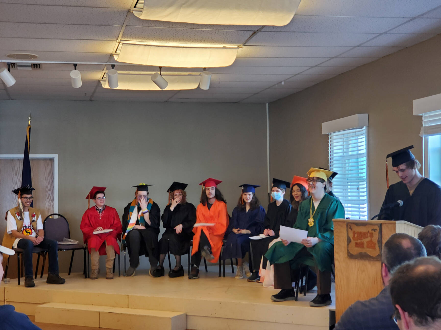 Homer Flex graduates listen to senior Wyatt Counts present his speech to the audience, thanking family, friends and Homer Flex staff at the Homer Flex High School commencement ceremony on Tuesday, May 14, 2024, at Land’s End Resort in Homer, Alaska. (Delcenia Cosman/Homer News)