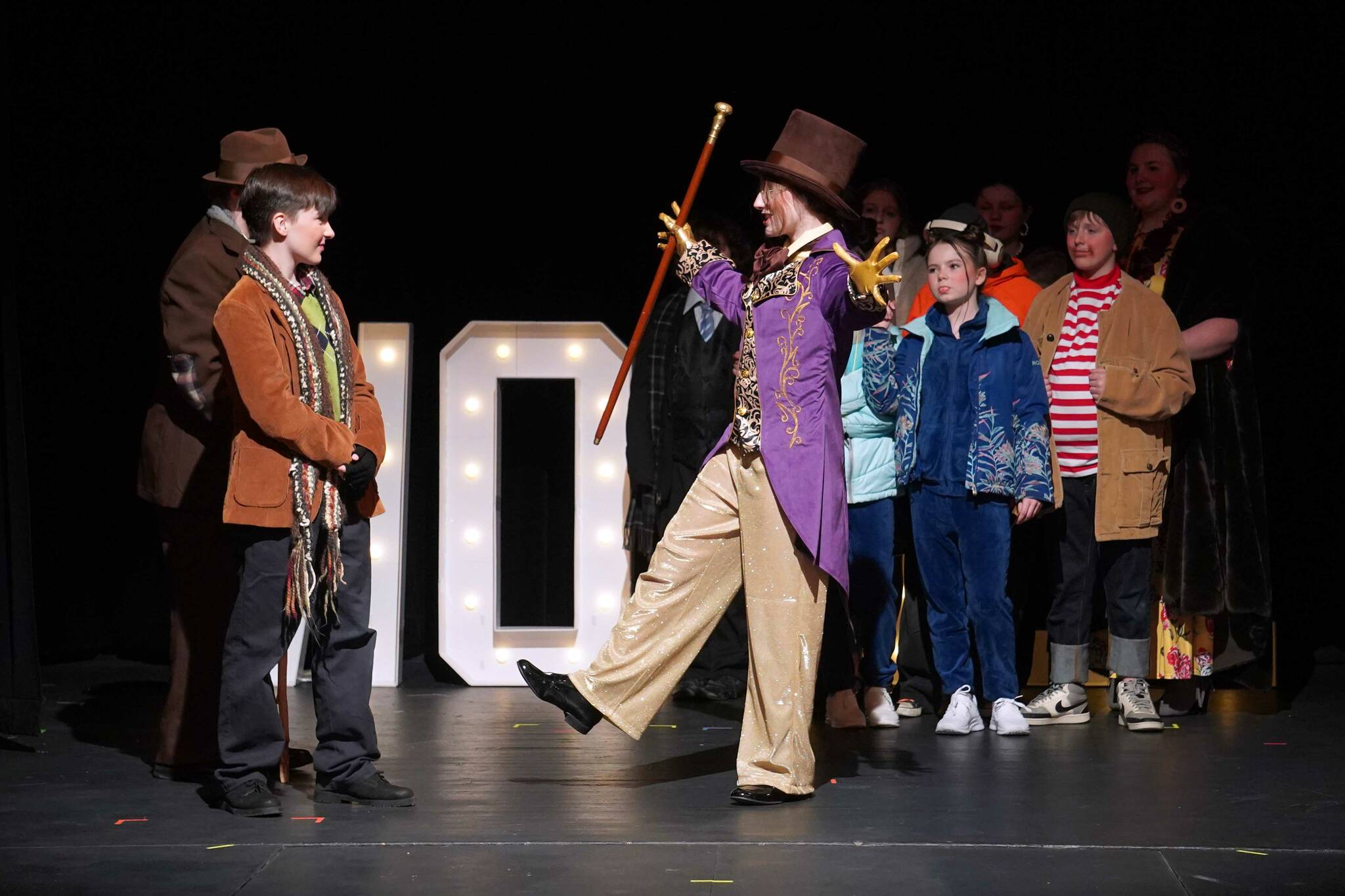 The cast of Seward High School Theatre Collective’s “Charlie and the Chocolate Factory” rehearse on Thursday, April 3, 2025. (Jake Dye/Peninsula Clarion)