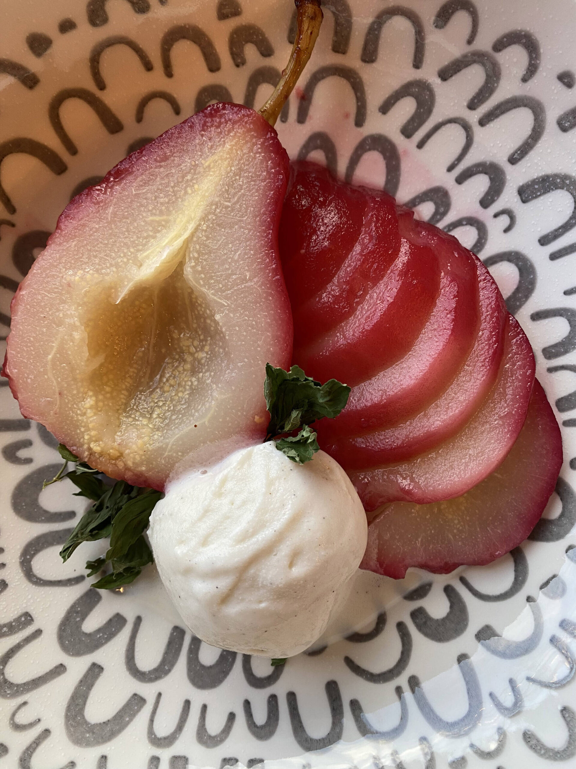 These poached pears get their red tinge from a cranberry juice bath. (Photo by Tressa Dale/Peninsula Clarion)