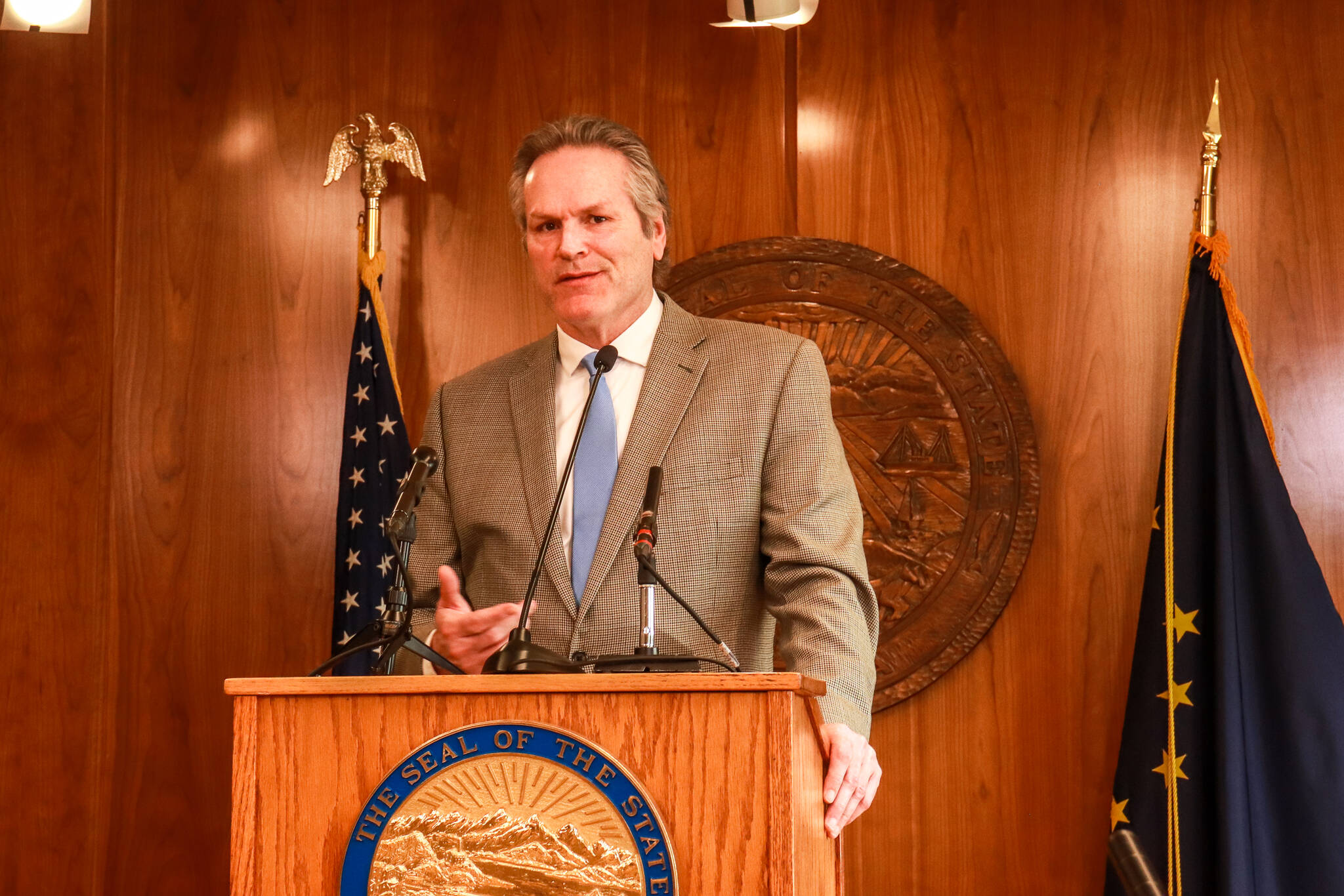 Gov. Mike Dunleavy (R-Alaska) speaks to reporters about his decision to veto an education funding bill at the Alaska State Capitol on Thursday, April 17, 2025. (Jasz Garrett / Juneau Empire)