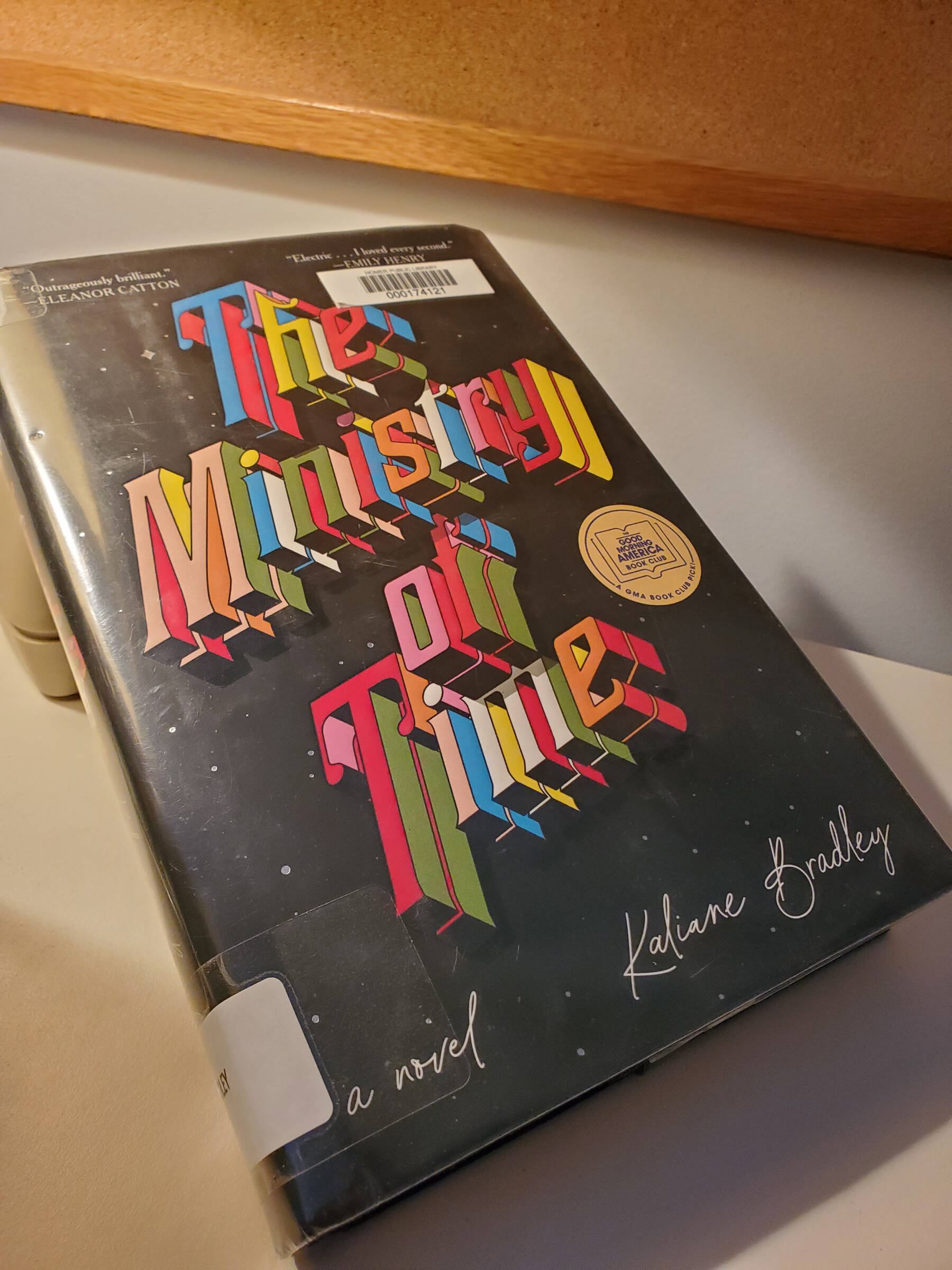 “The Ministry of Time” by Kaliane Bradley sits on a desk in the Homer News newsroom on Friday, April 18, 2025, in Homer, Alaska. (Delcenia Cosman/Homer News)
