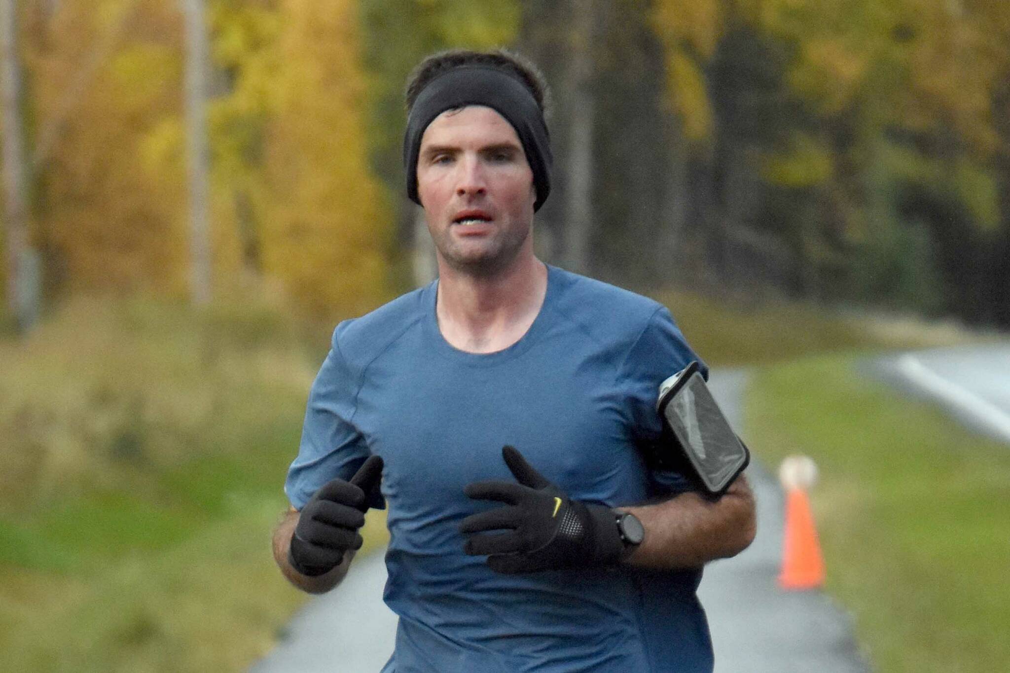 Lee Frey runs to victory in the men's half marathon at the Kenai River Marathon on Sunday, Sept. 25, 2022, in Kenai, Alaska. (Photo by Jeff Helminiak/Peninsula Clarion)