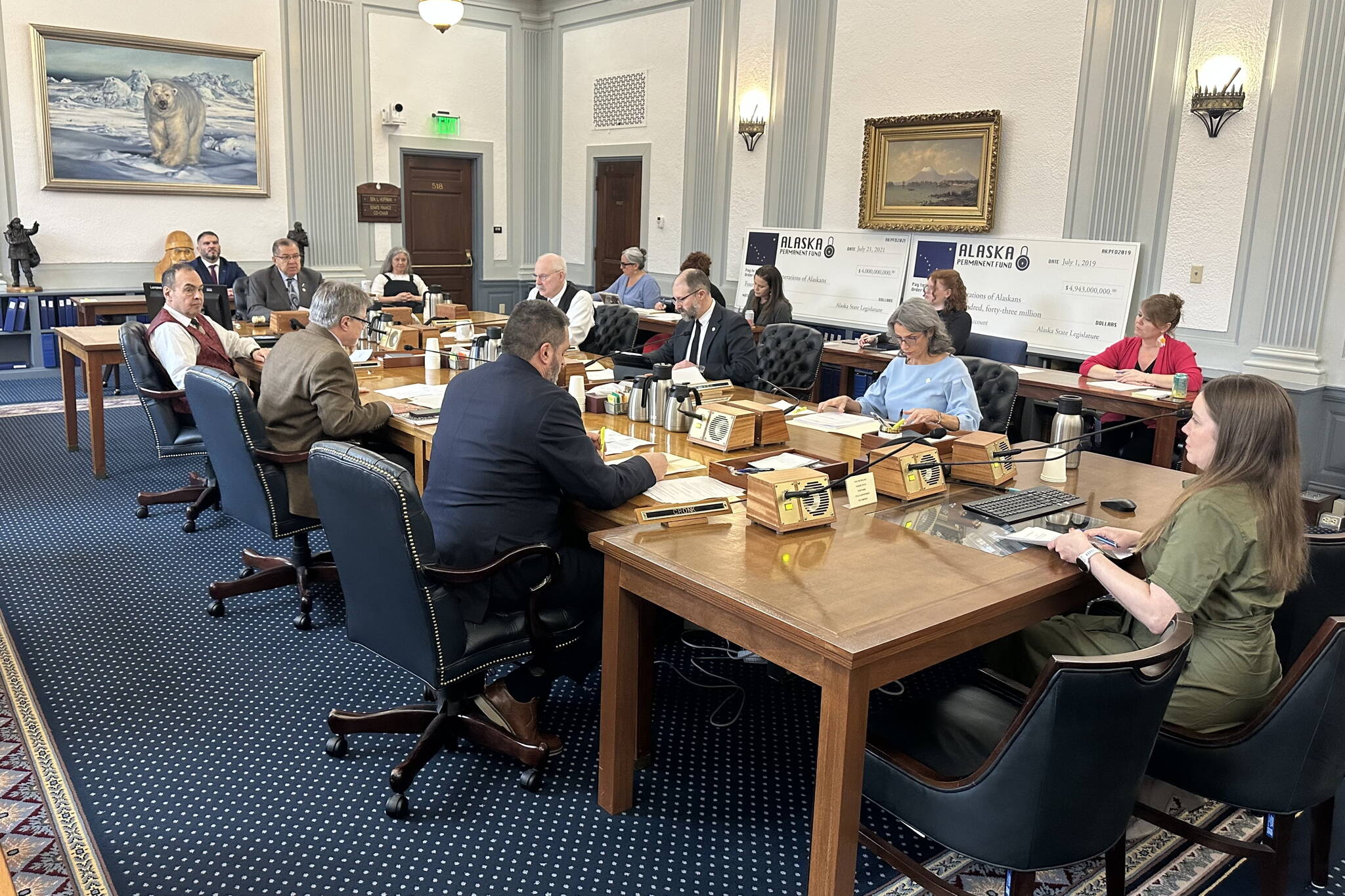 Liz Harpold, a staff member for Sen. Donny Olson (D-Golovin)​, explains changes to a bill increasing per-student education funding and making various policy changes during a Senate Finance Committee meeting on Thursday, April 24, 2025. (Mark Sabbatini / Juneau Empire)