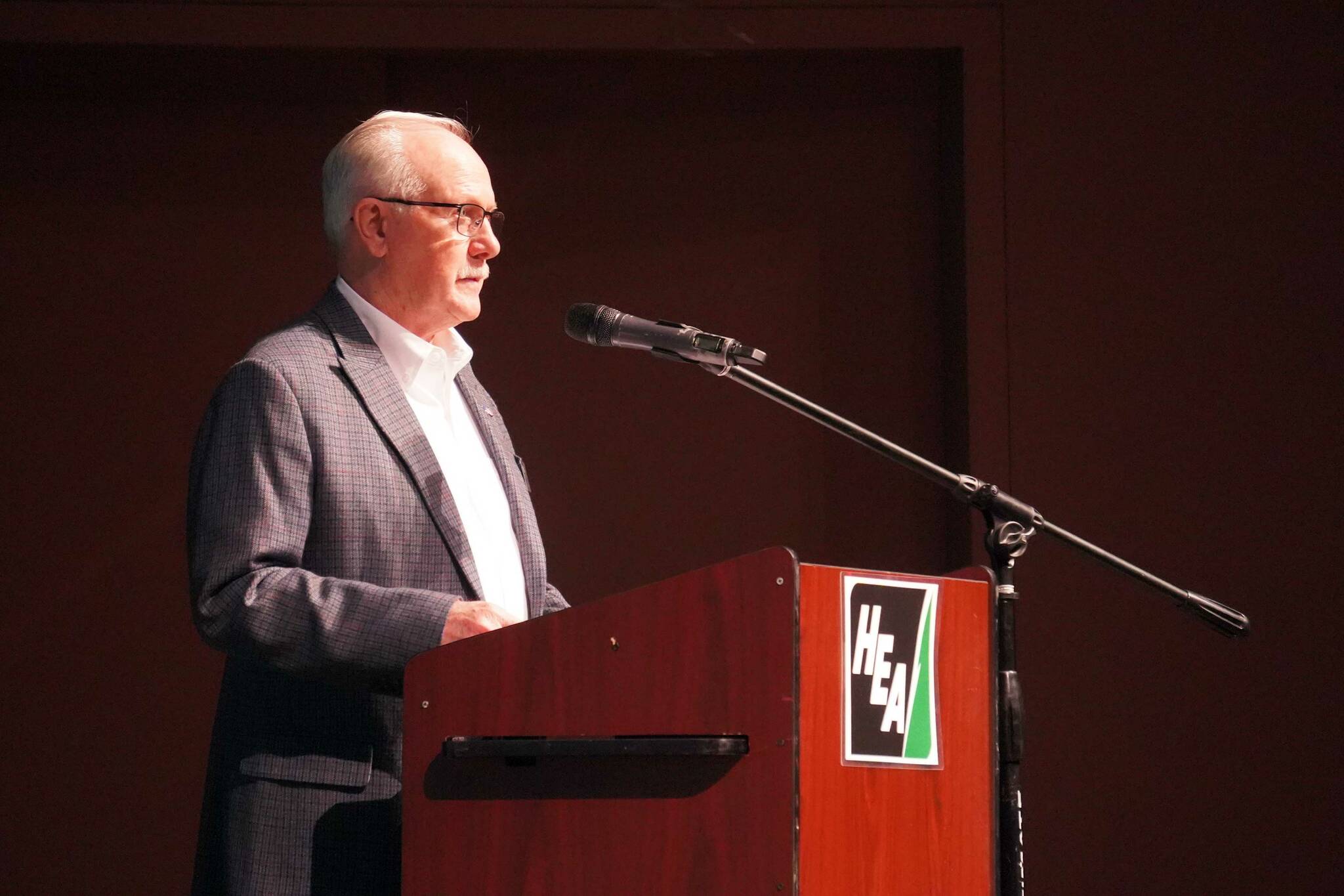 Homer Electric Association Board President Dan Furlong speaks after being reelected at the utility’s annual meeting of the members at Kenai Central High School in Kenai, Alaska, on Thursday, May 1, 2025. (Jake Dye/Peninsula Clarion)