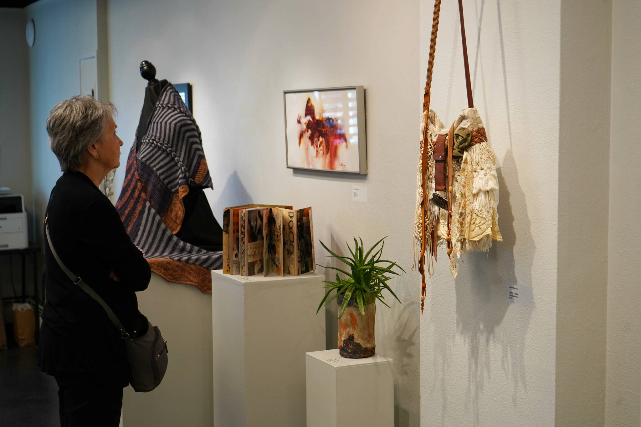 Artwork by The Art Gaggle is displayed as part of “What We Do” at the Kenai Art Center on Friday, May 2, 2025. (Jake Dye/Peninsula Clarion)
