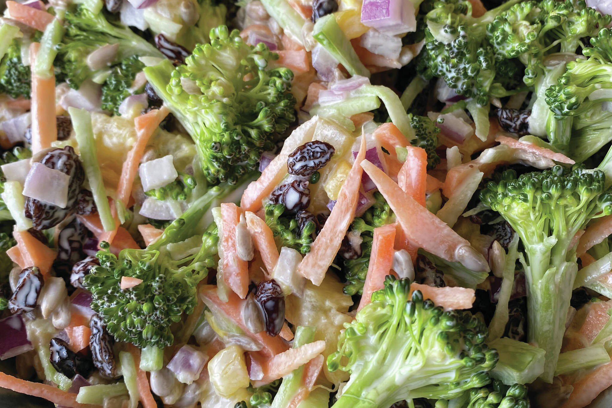 This salad mixes broccoli, carrots and pineapple chunks for a bright, sweet dish. (Photo by Tressa Dale/Peninsula Clarion)